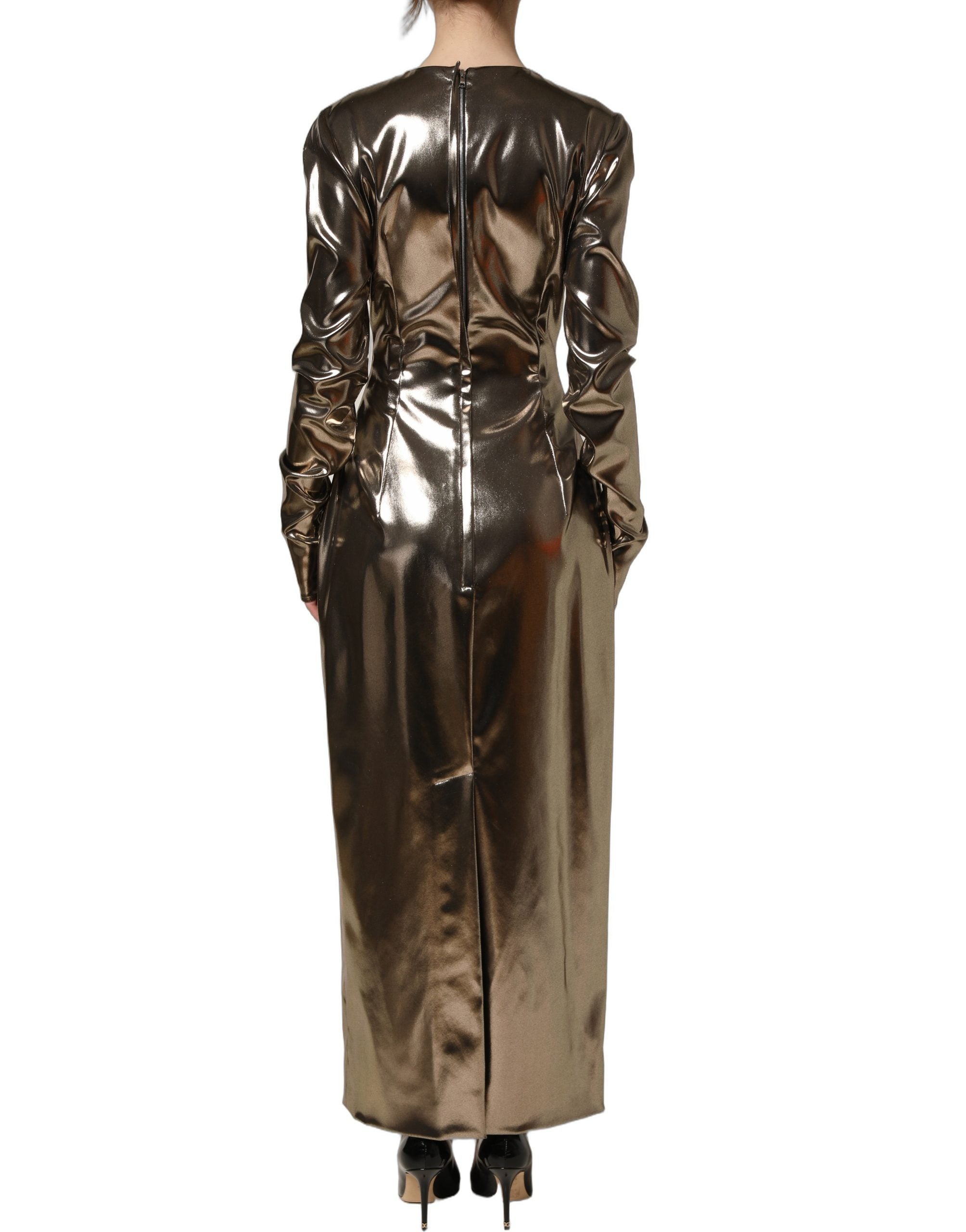 Indulge in the exquisite Dolce & Gabbana Metallic Gold Maxi Dress, a masterpiece of luxurious craftsmanship that embodies sophistication and allure for unforgettable moments.