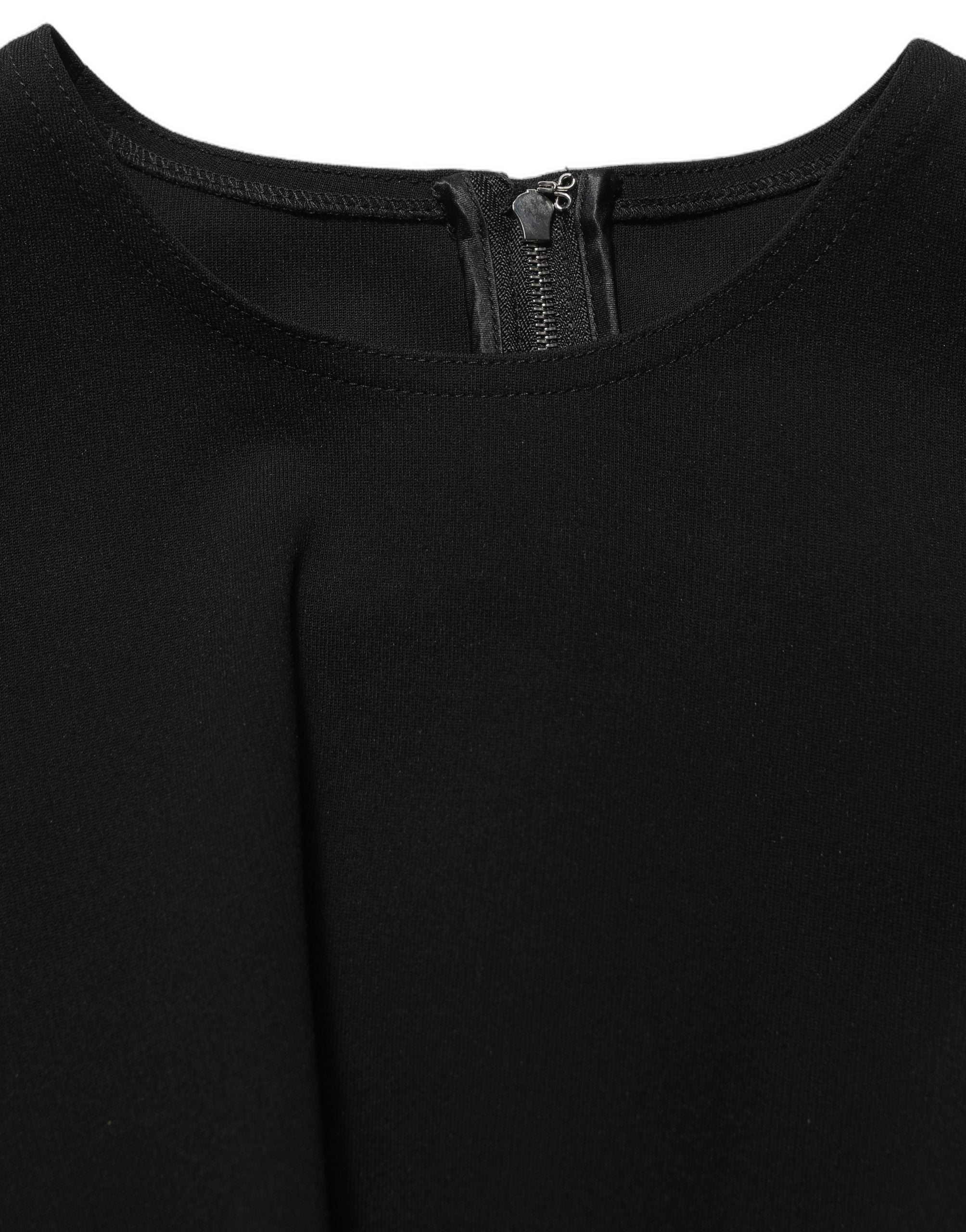 Discover the Dolce & Gabbana Black Cut Out Detail Sleeveless Maxi Dress, a masterpiece of Italian craftsmanship, blending elegance and allure for unforgettable moments.