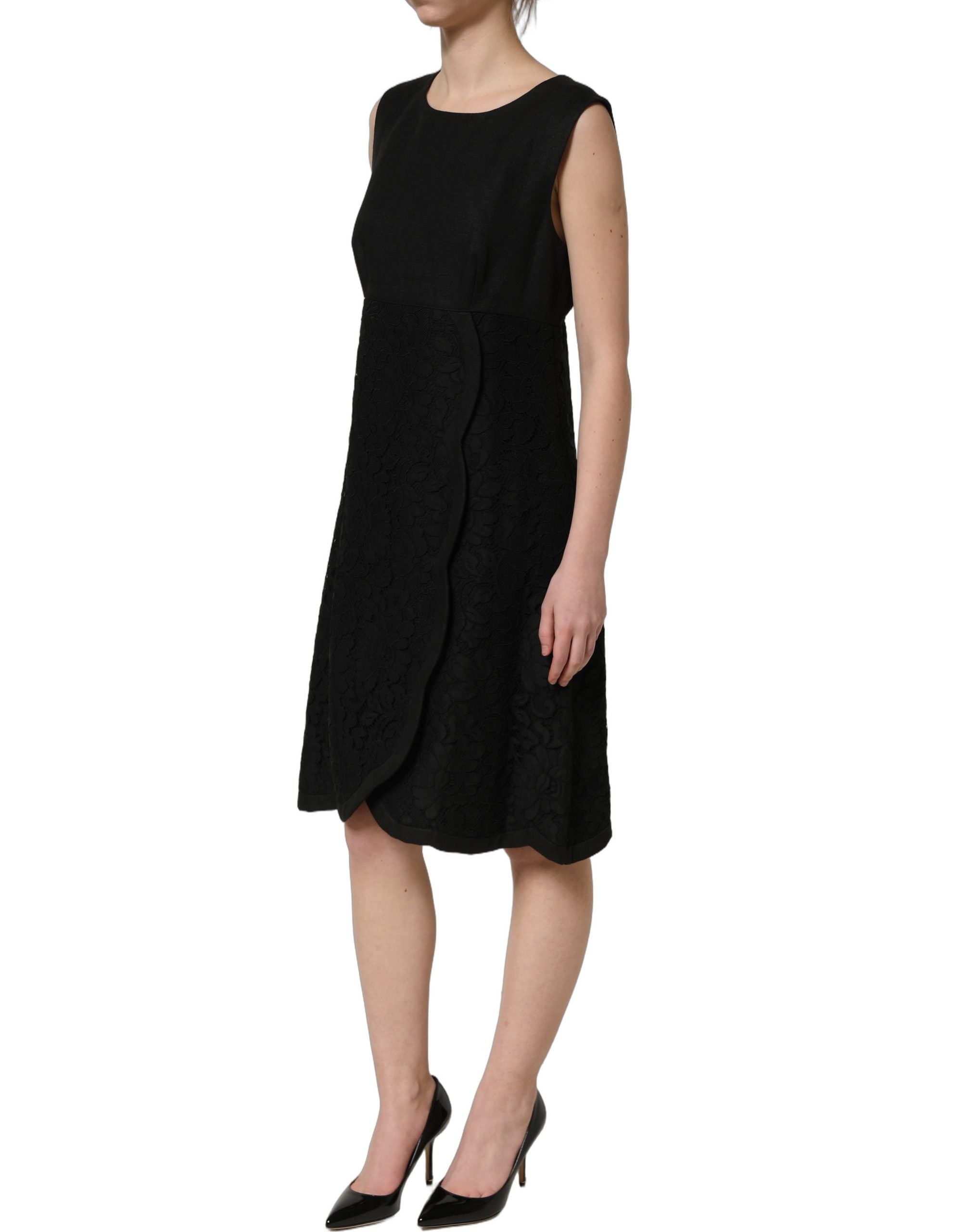 Indulge in the exquisite allure of the Dolce & Gabbana Black Floral Lace Sleeveless Shift Dress, a masterpiece of Italian craftsmanship that embodies timeless elegance and sophistication.