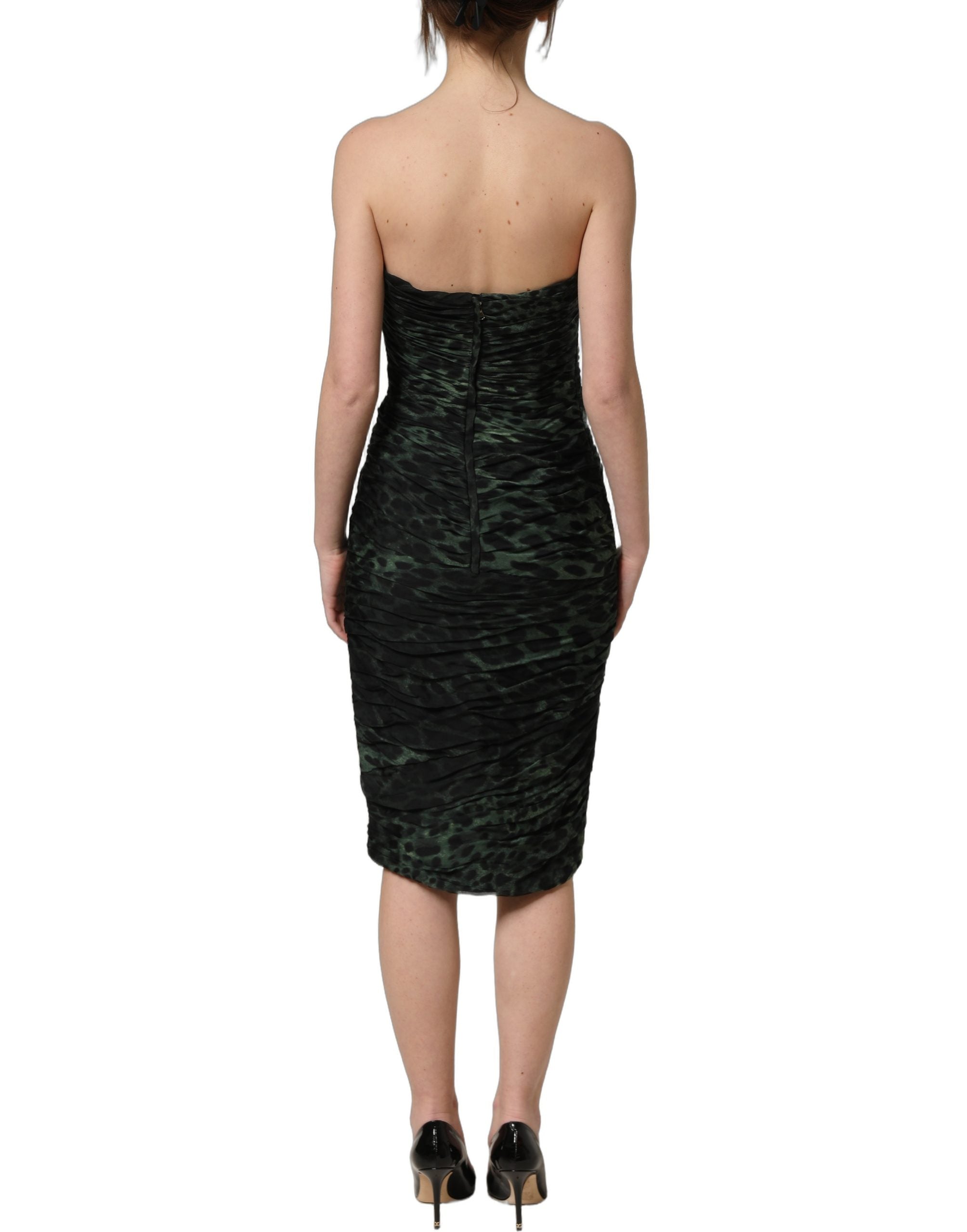 Experience the allure of the Dolce & Gabbana Green Leopard Print Bustier Draped Midi Dress, a silk masterpiece that embodies luxury and sophistication for the discerning individual.