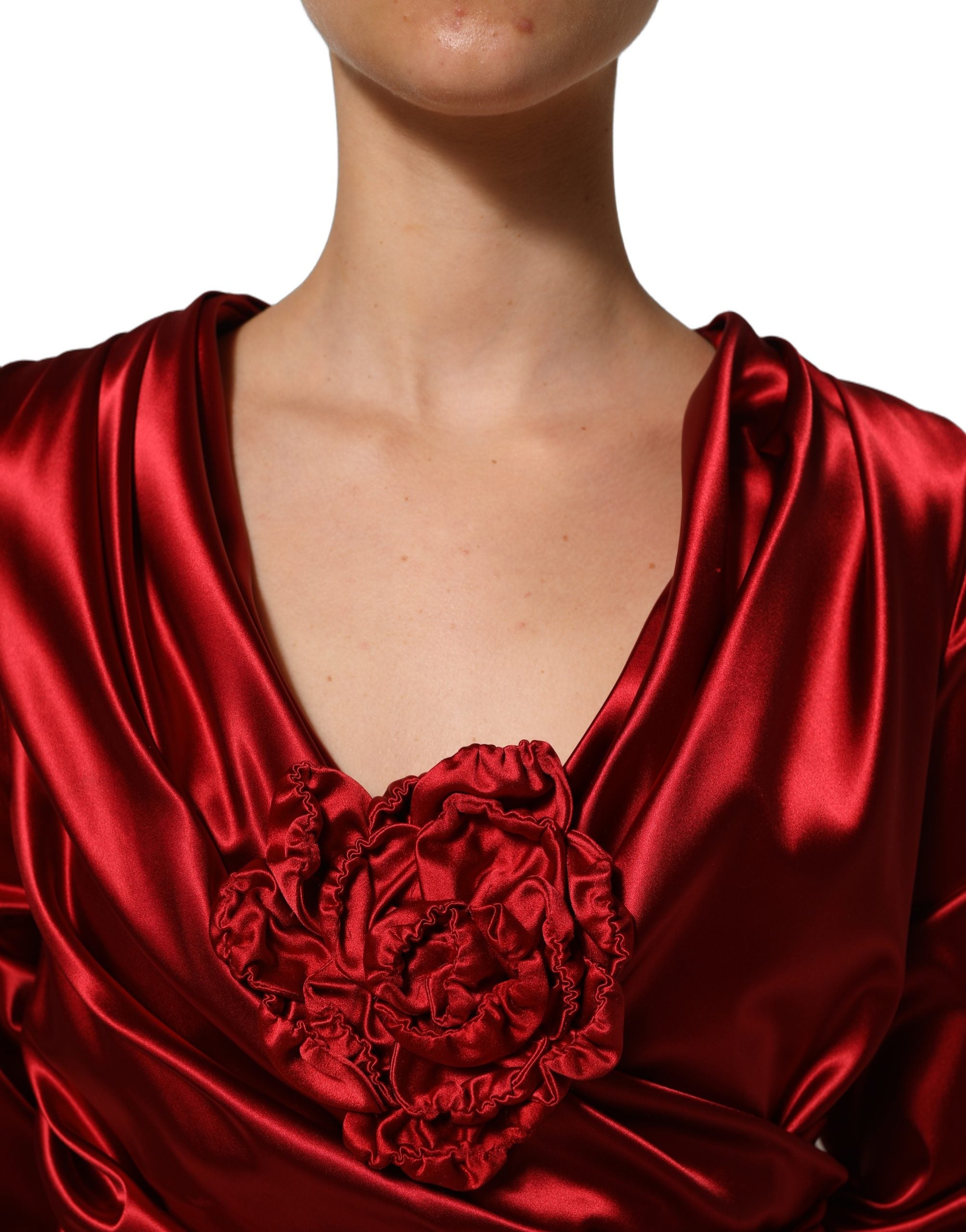 Experience the allure of Dolce & Gabbana's Red Silk Satin Draped Midi Floral Applique Dress, a masterpiece of Italian craftsmanship that embodies luxury and sophistication.