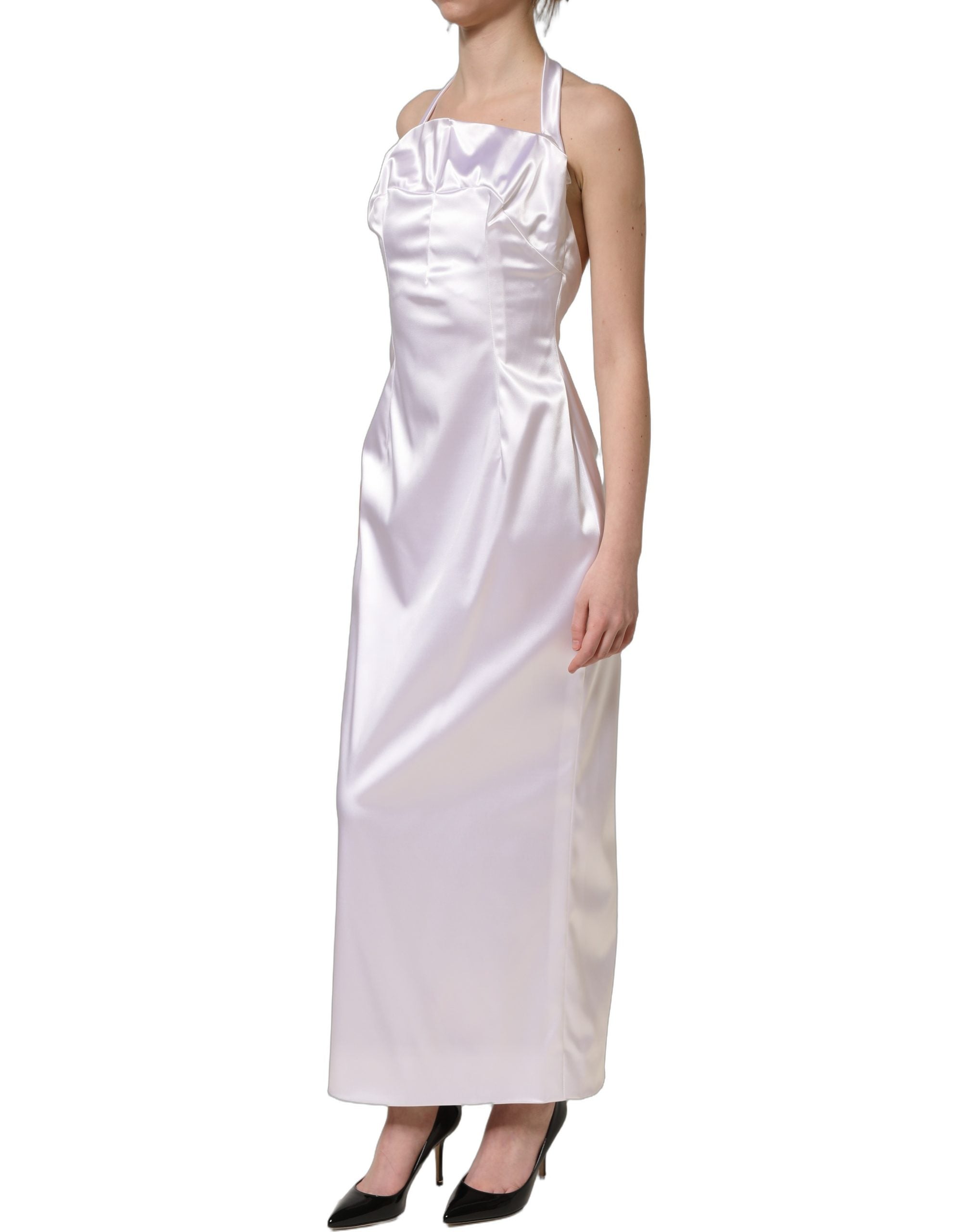 Experience the allure of the Dolce & Gabbana White Satin Halter Backless Long Gown, a testament to Italian craftsmanship that redefines elegance and sophistication.