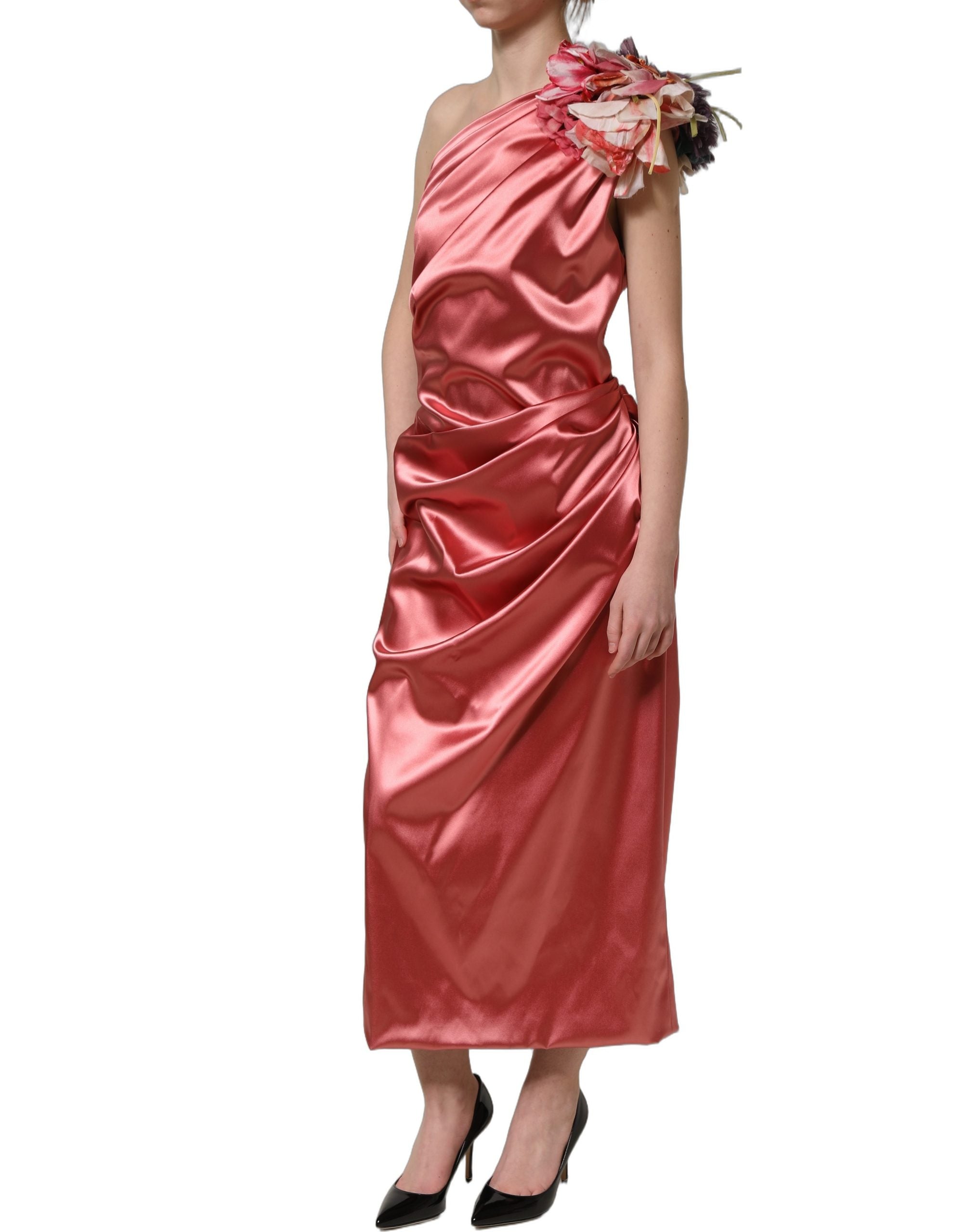 Experience the allure of the Dolce & Gabbana Pink Draped Midi Dress, a masterpiece of exquisite craftsmanship and luxurious materials, perfect for sophisticated occasions.