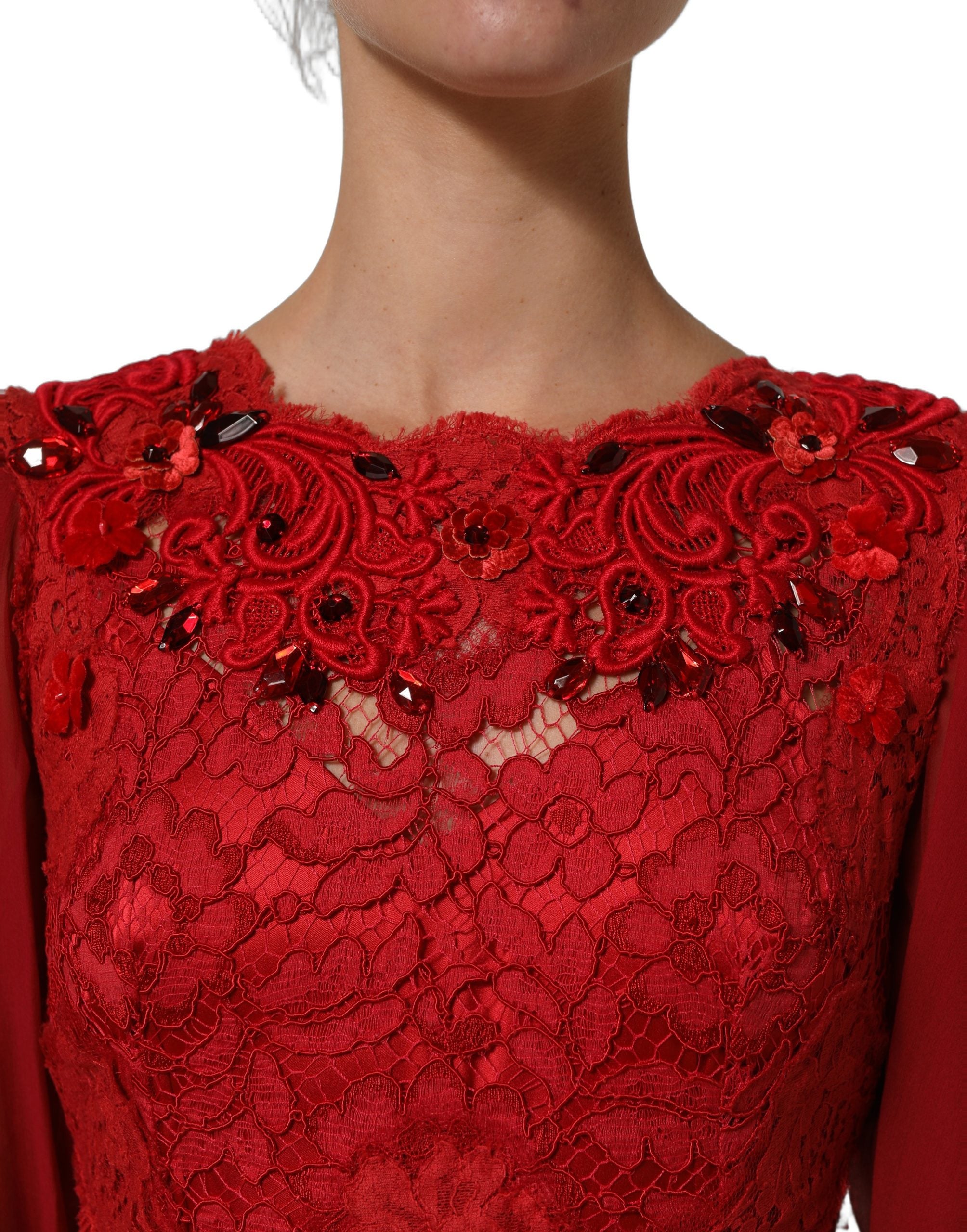 Indulge in the exquisite allure of the Dolce & Gabbana Red Embellished Mermaid Long Gown, a masterpiece of Italian craftsmanship that elevates your elegance and sophistication.