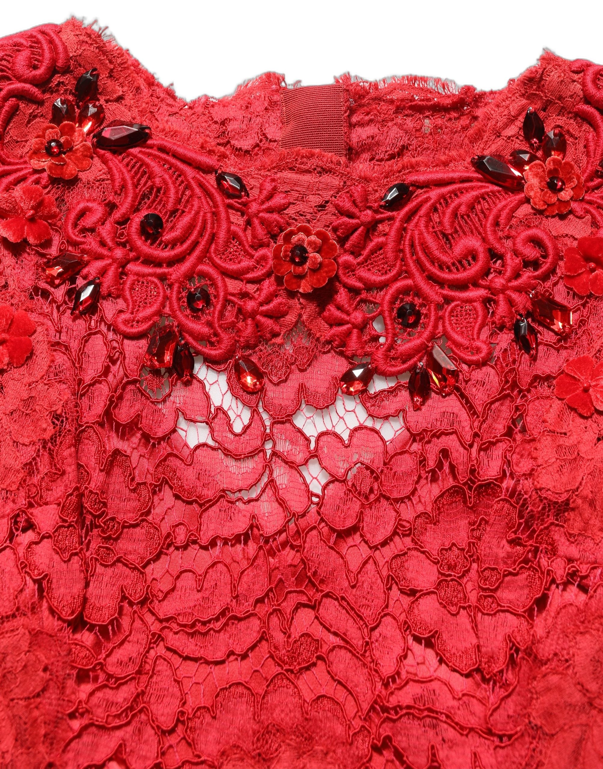 Experience the allure of the Dolce & Gabbana Red Embellished Mermaid Long Gown, a masterpiece of Italian craftsmanship that epitomizes luxury and elegance.
