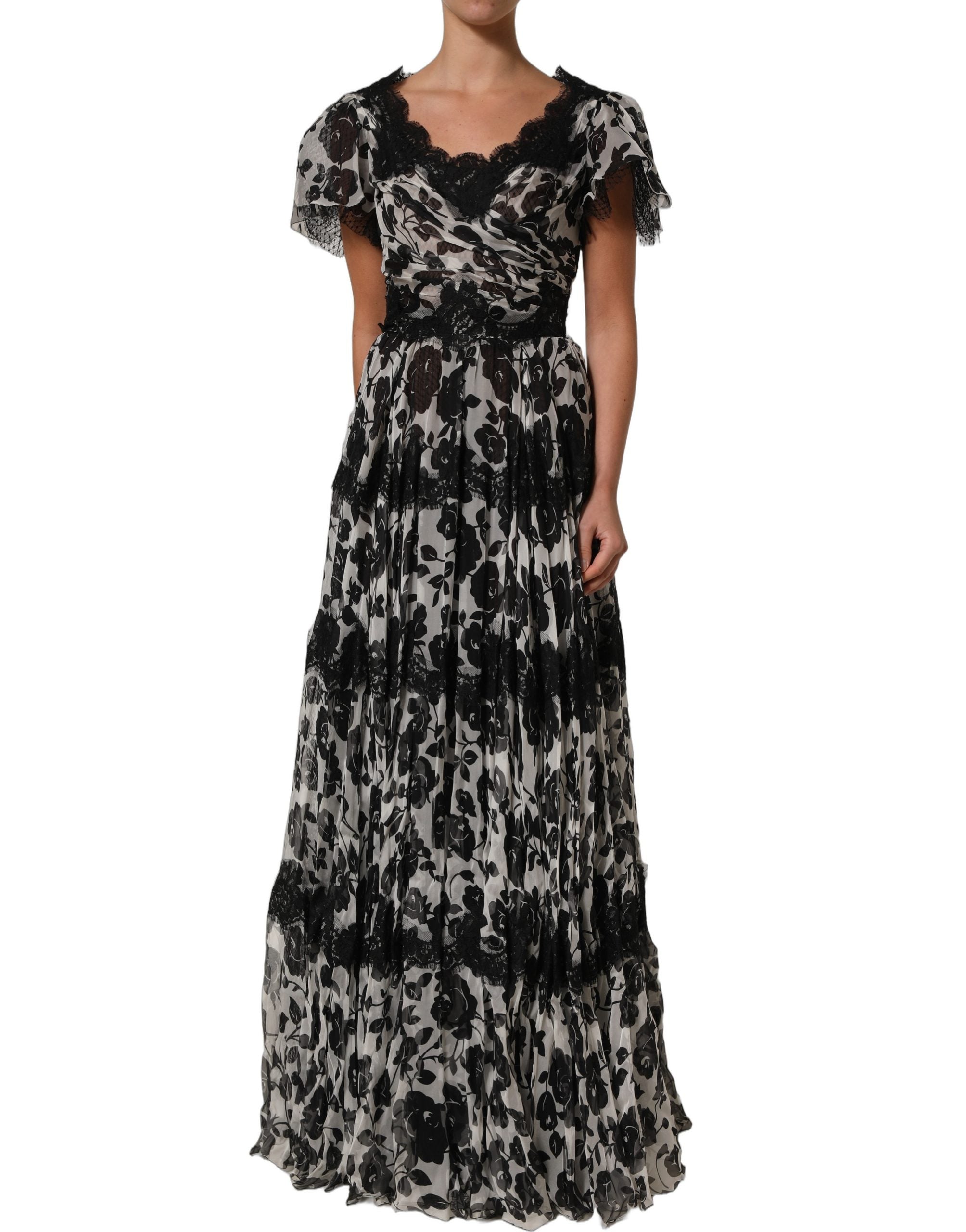 Indulge in the exquisite Dolce & Gabbana Black Silk Floral Lace Ricamo Ball Maxi Dress, a timeless masterpiece of luxury, crafted for those who embody elegance and sophistication.