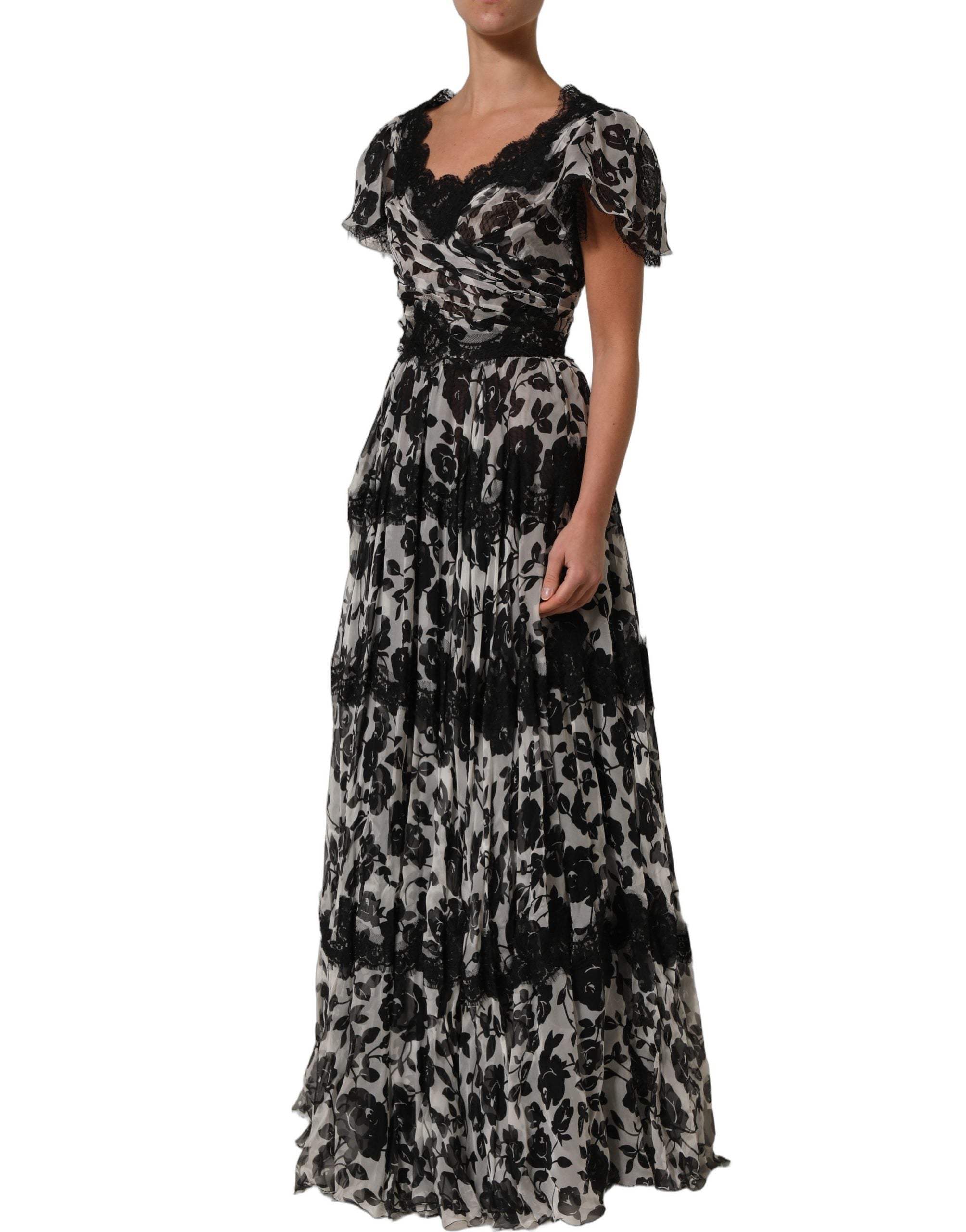 Experience the allure of the Dolce & Gabbana Black Silk Floral Lace Ricamo Ball Maxi Dress, where exquisite craftsmanship meets timeless elegance, perfect for unforgettable moments.