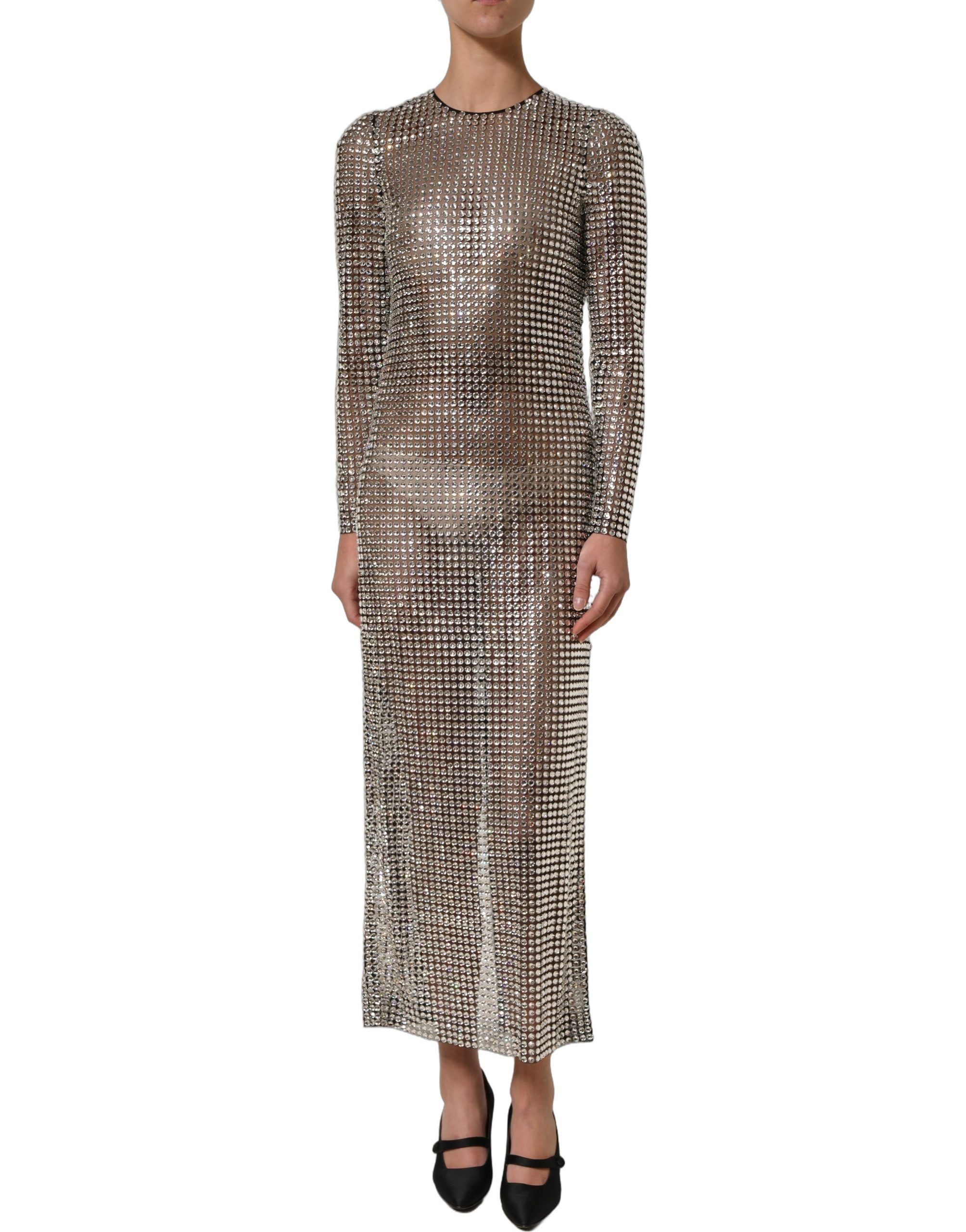 Indulge in the exquisite allure of Dolce & Gabbana's Beige Crystal Embellished Long Gown, a masterpiece of luxury craftsmanship that redefines elegance for discerning individuals.
