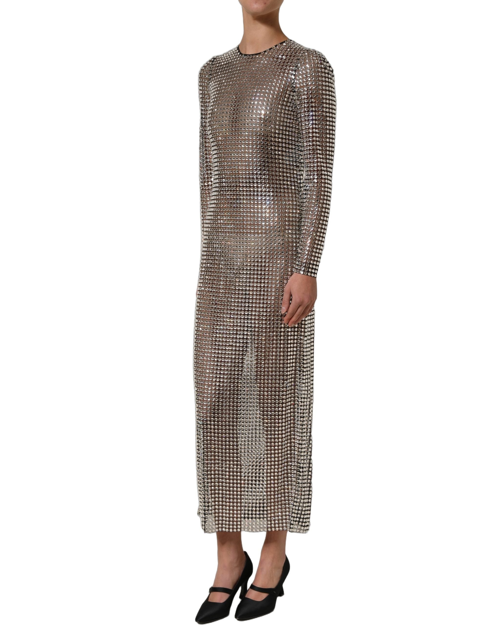 Experience the exquisite allure of Dolce & Gabbana's Beige Crystal Embellished Long Gown, a masterpiece of Italian craftsmanship that redefines luxury and elegance.