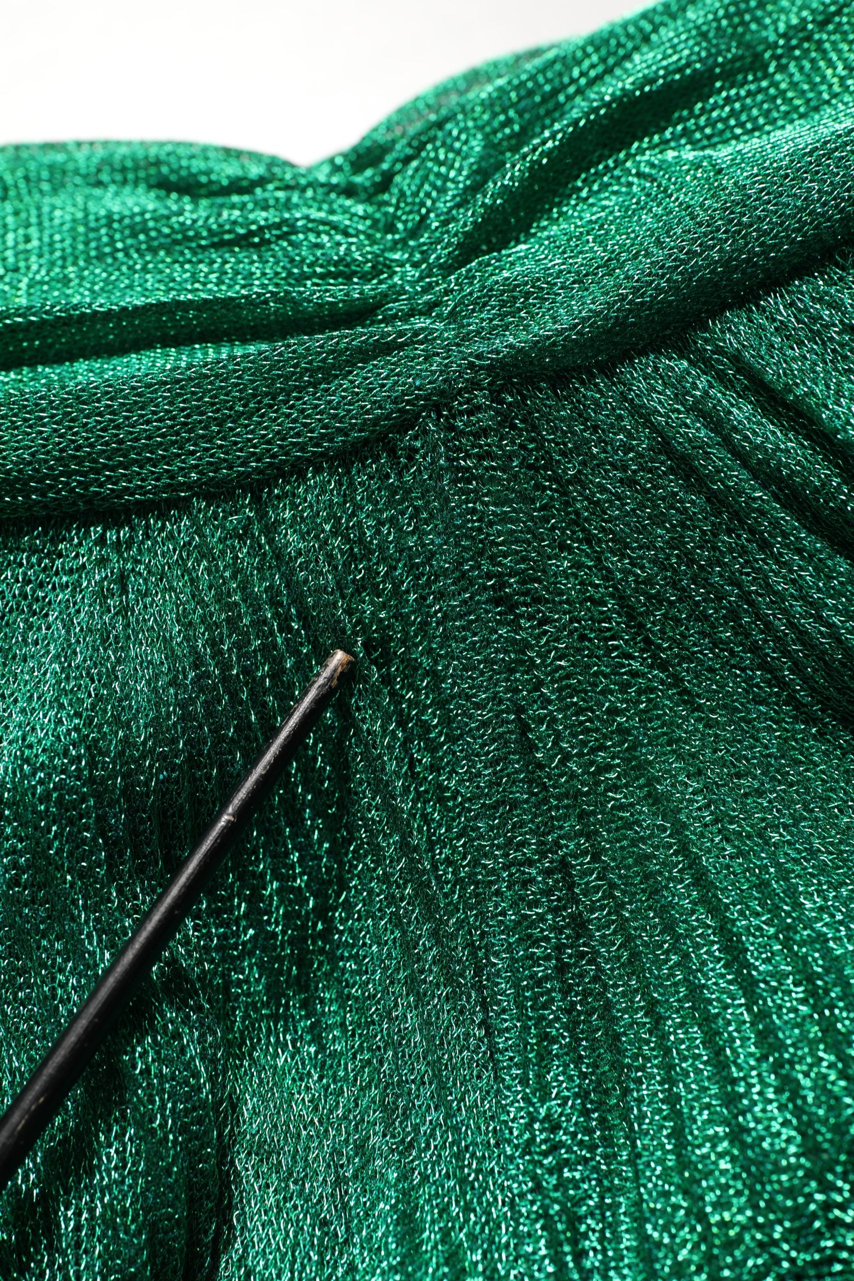 Indulge in the exquisite Dolce & Gabbana Emerald Green Plissé Evening Gown, a masterpiece of luxurious craftsmanship and timeless elegance, perfect for unforgettable occasions.