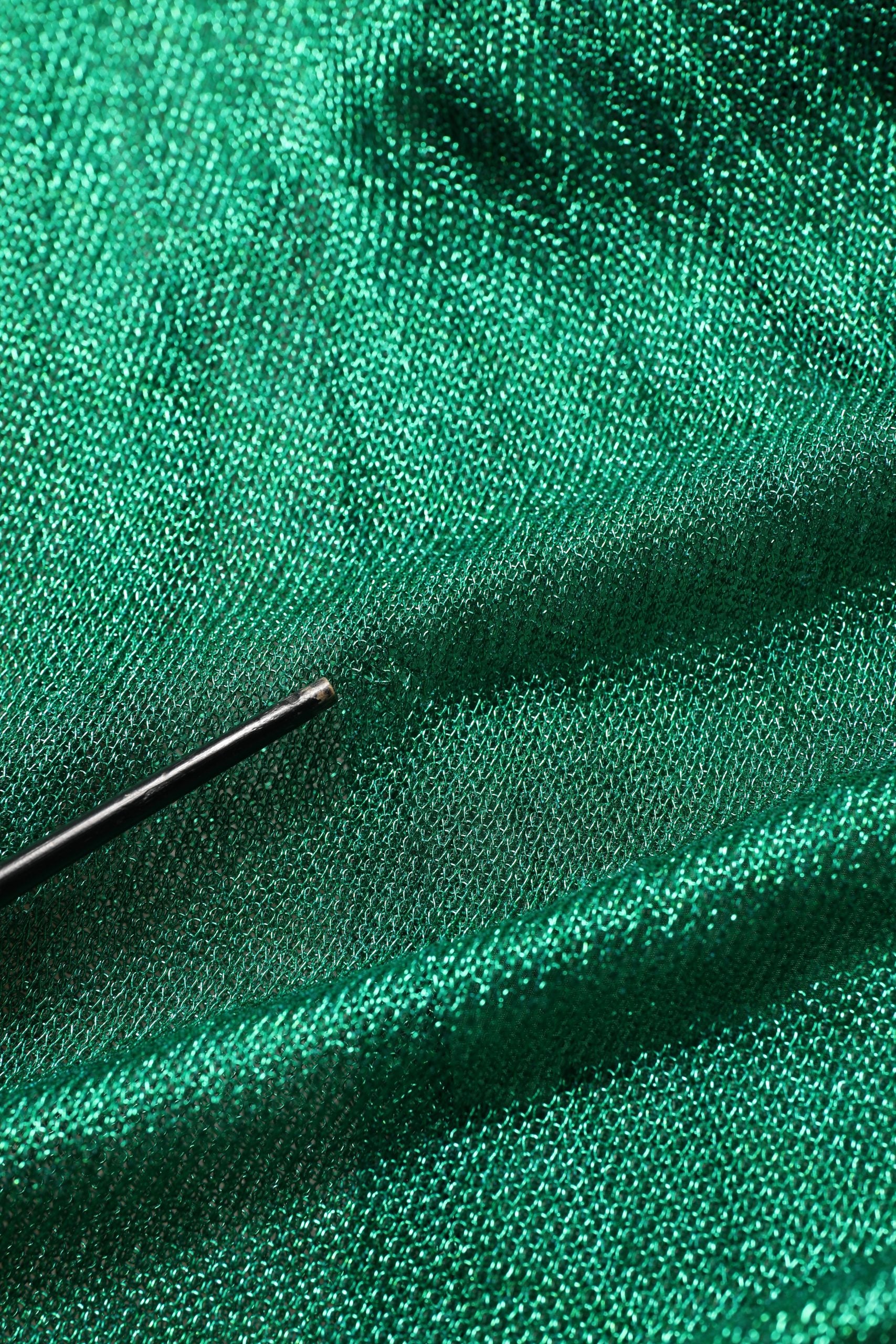 Indulge in the exquisite Dolce & Gabbana Emerald Green Plissé Evening Gown, a luxurious blend of silk and viscose that embodies timeless elegance for unforgettable occasions.