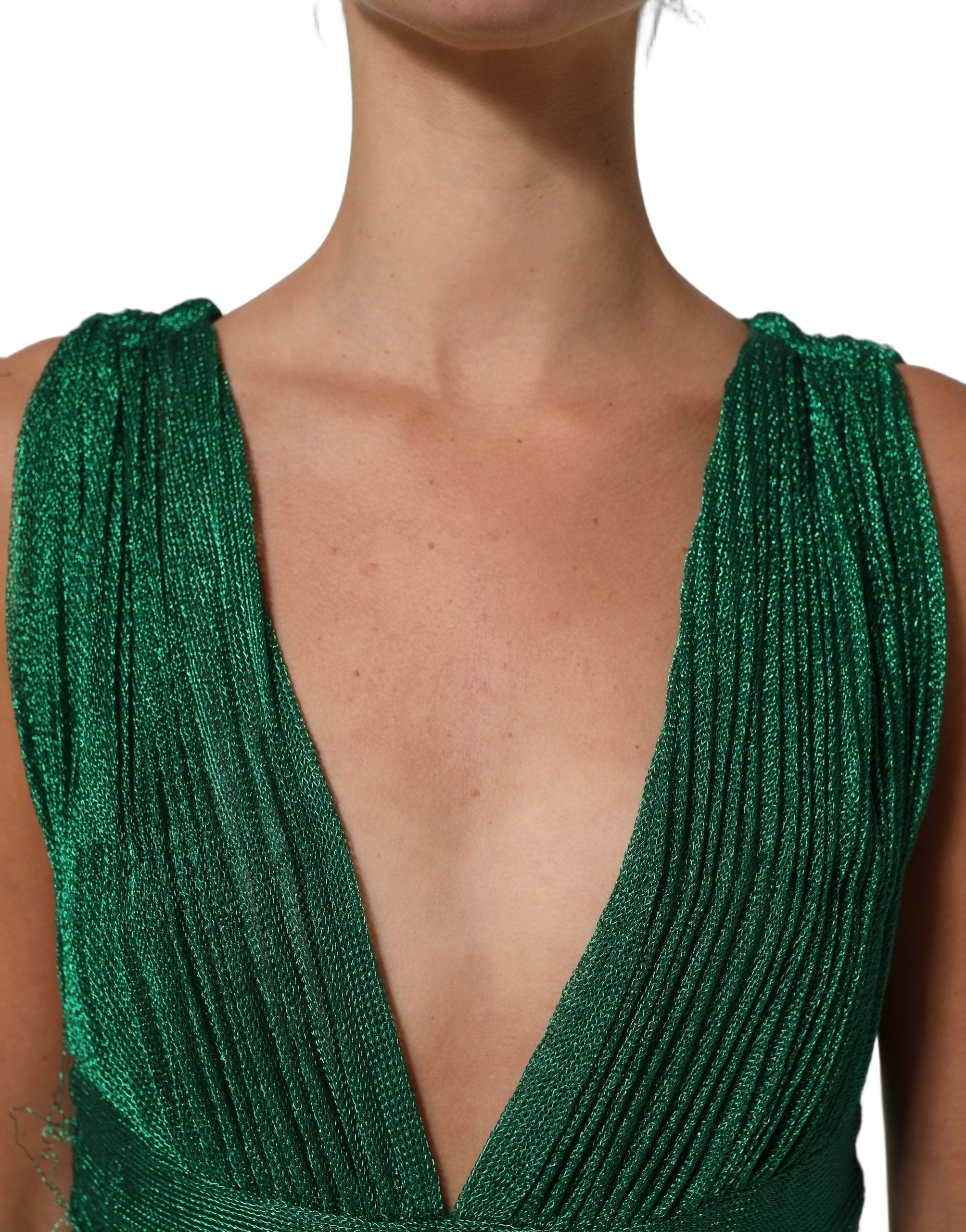 Indulge in the exquisite Dolce & Gabbana Emerald Green Plissé Evening Gown, a masterpiece of luxury craftsmanship designed to elevate your elegance for any grand occasion.