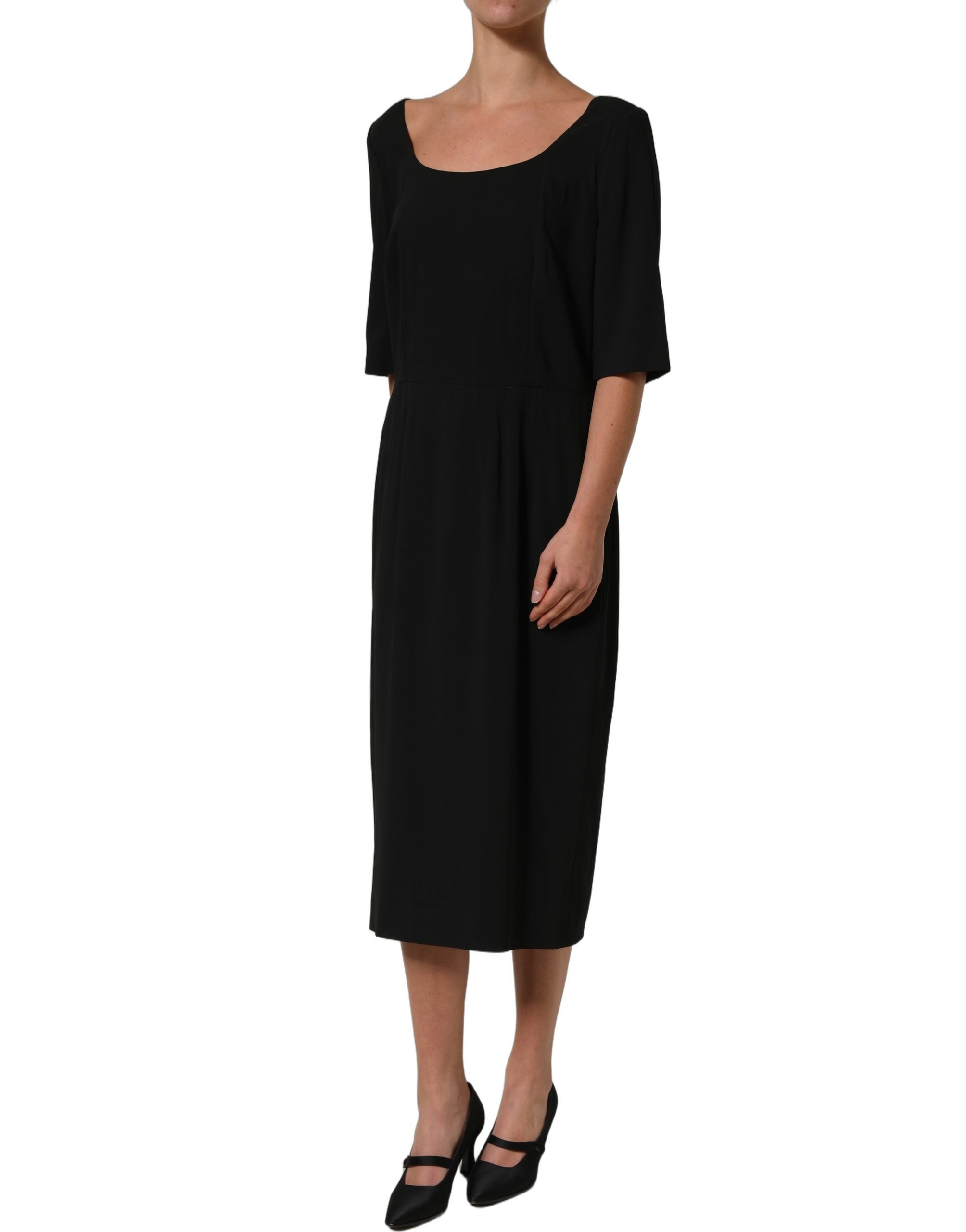 Elevate your wardrobe with the Dolce & Gabbana Black Viscose Cropped Sleeves Midi Dress, a masterpiece of Italian craftsmanship that embodies timeless elegance and allure.