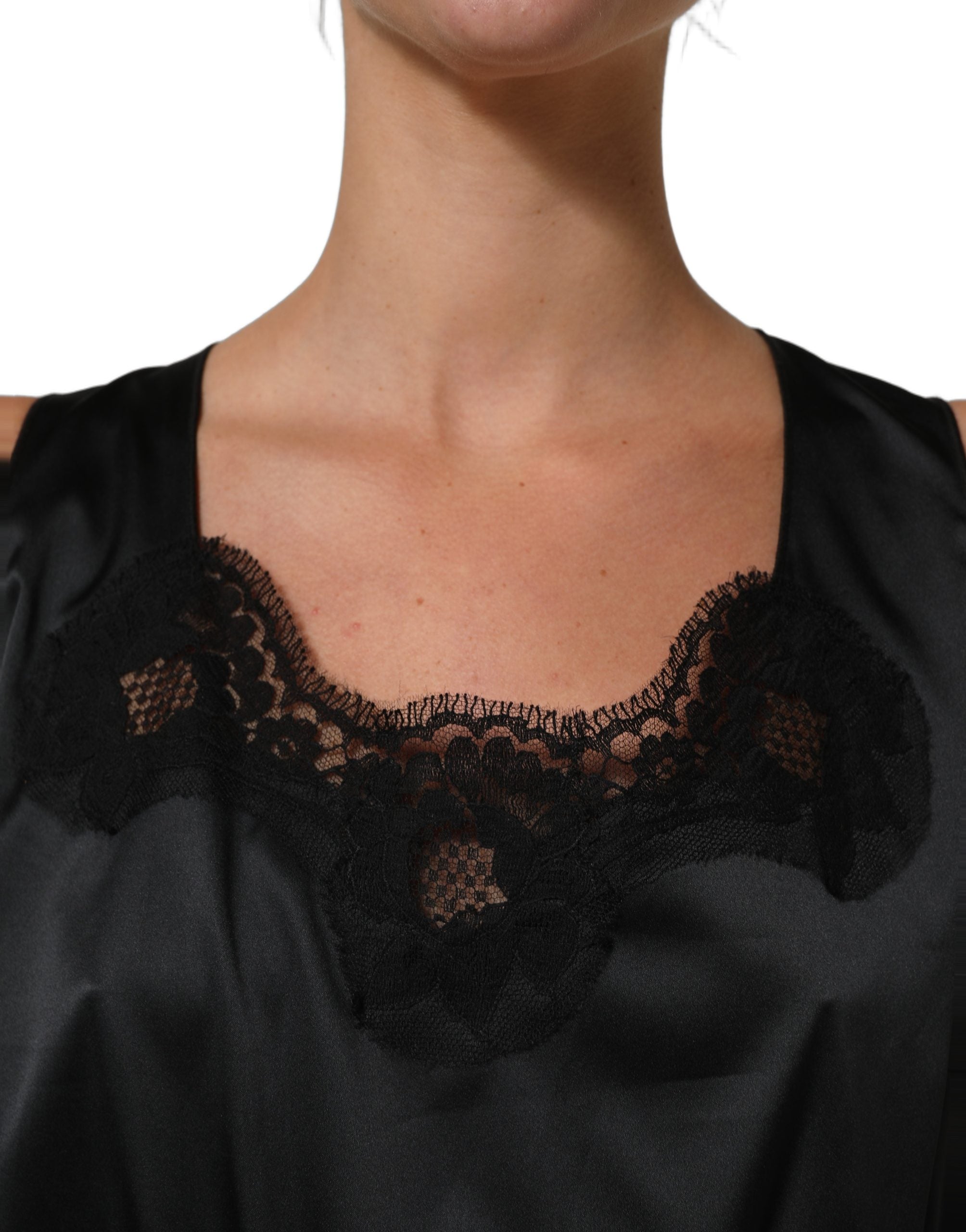 Elevate your elegance with the Dolce & Gabbana Black Lace Trim Midi Dress, a masterpiece of Italian craftsmanship that embodies timeless sophistication and allure.