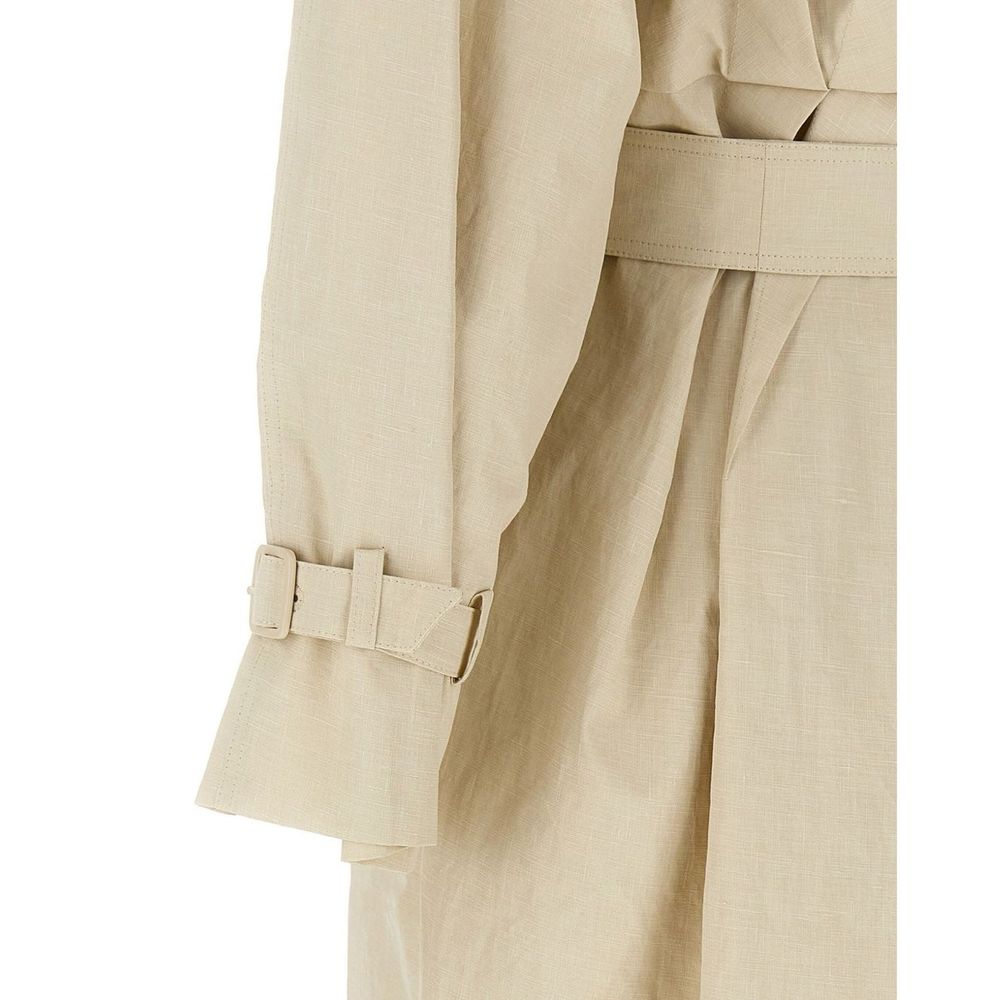 Discover the Max Mara Beige Cotton Coat, a masterpiece of tailored elegance crafted from 100% cotton, embodying timeless sophistication for the discerning individual.