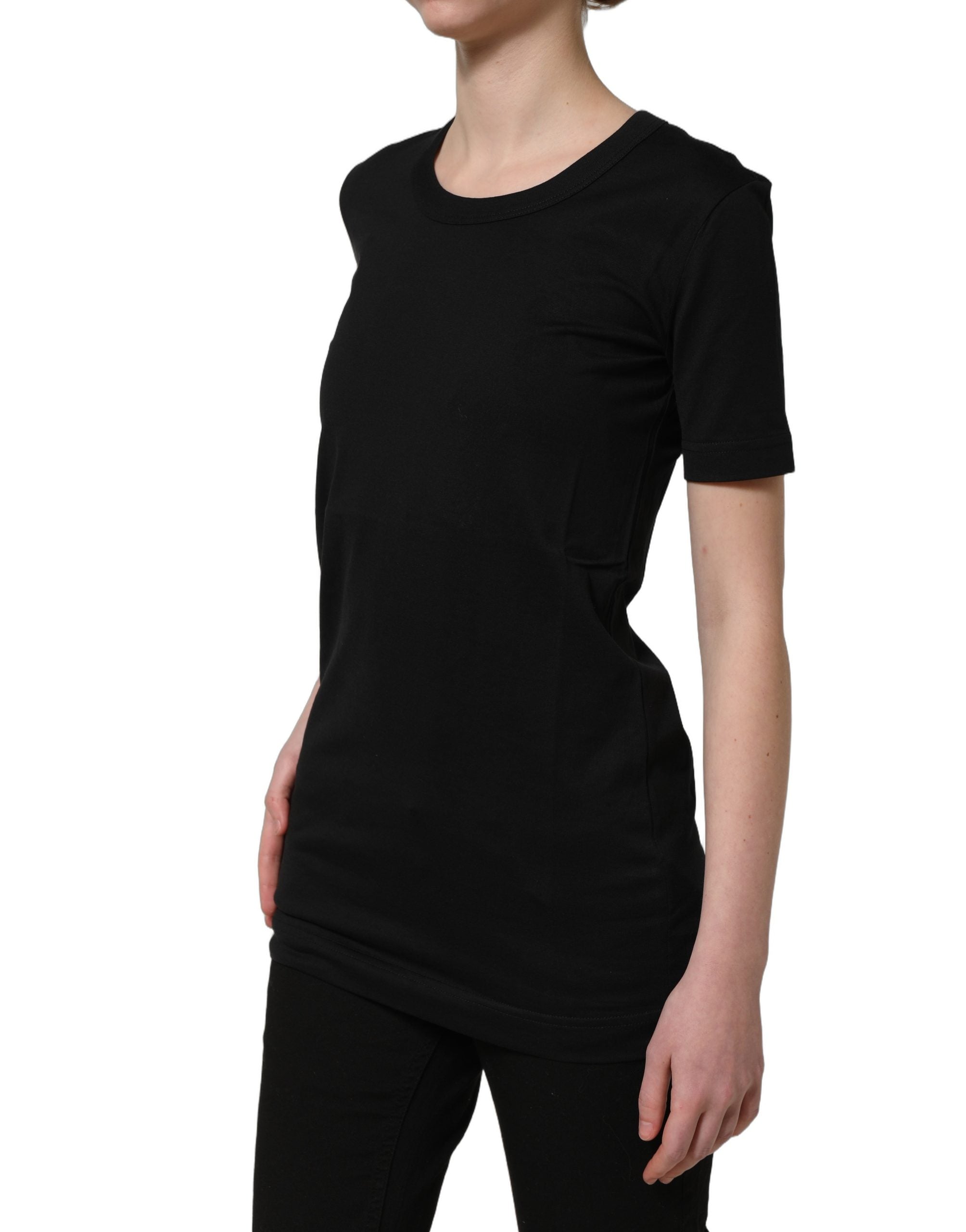 Elevate your wardrobe with the Dolce & Gabbana Black Cotton Crew Neck T-shirt, a masterpiece of Italian craftsmanship that embodies timeless luxury and effortless elegance.