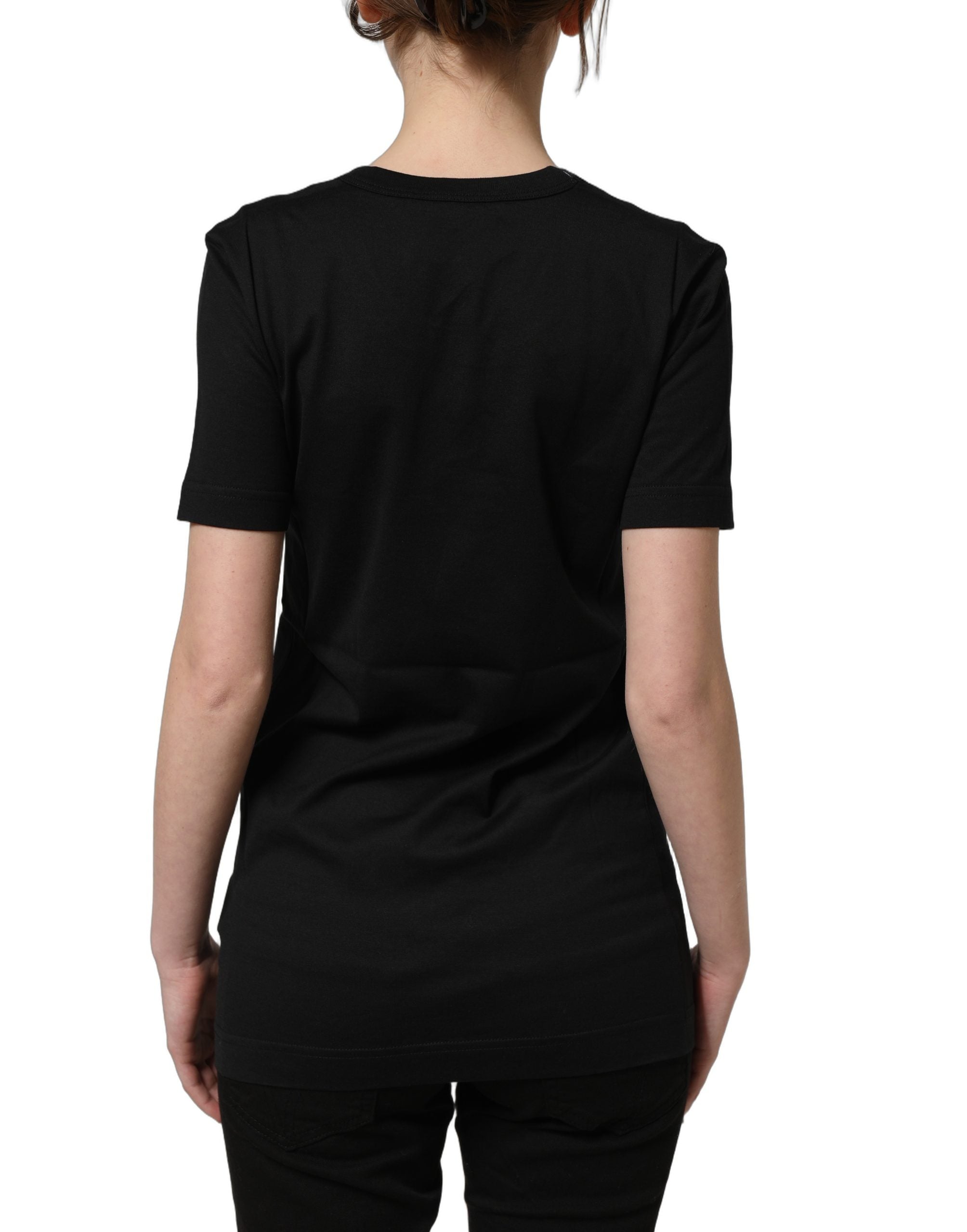 Experience the exquisite allure of Dolce & Gabbana's Black Cotton Crew Neck T-shirt, a timeless embodiment of Italian craftsmanship and effortless elegance for every occasion.