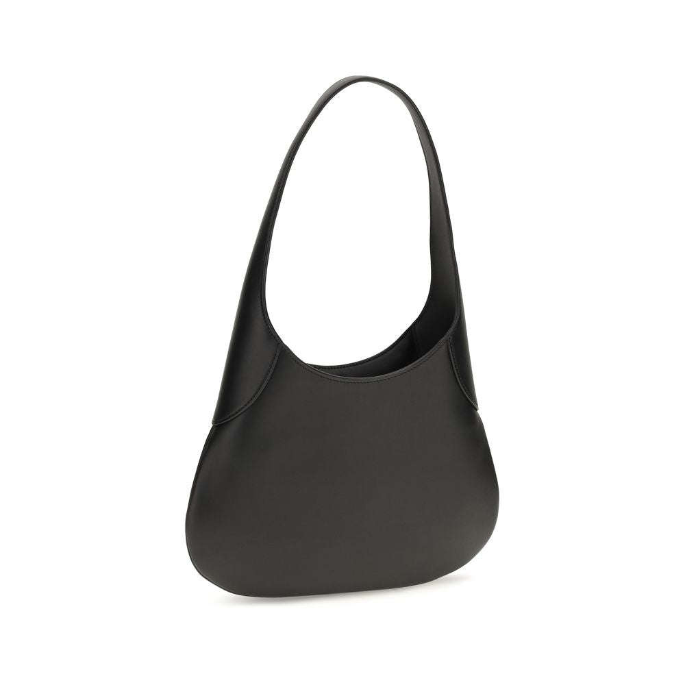 Discover the Khaite Black Calf Leather Bos Taurus Handbag, a symbol of artisanal luxury and elegance, crafted for those who appreciate refined sophistication.