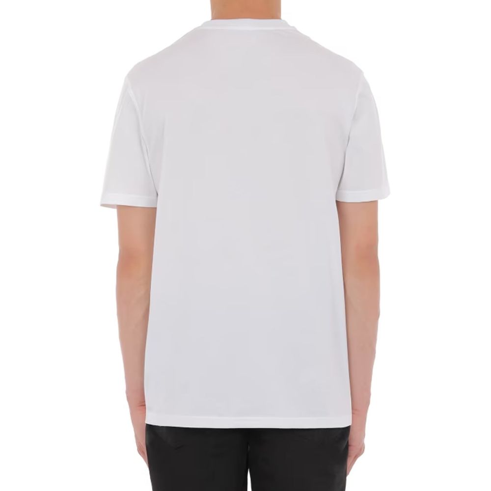 Discover the Moschino Couture White Cotton T-Shirt, an embodiment of luxury and sophistication, crafted from 100% cotton for unparalleled comfort and style.