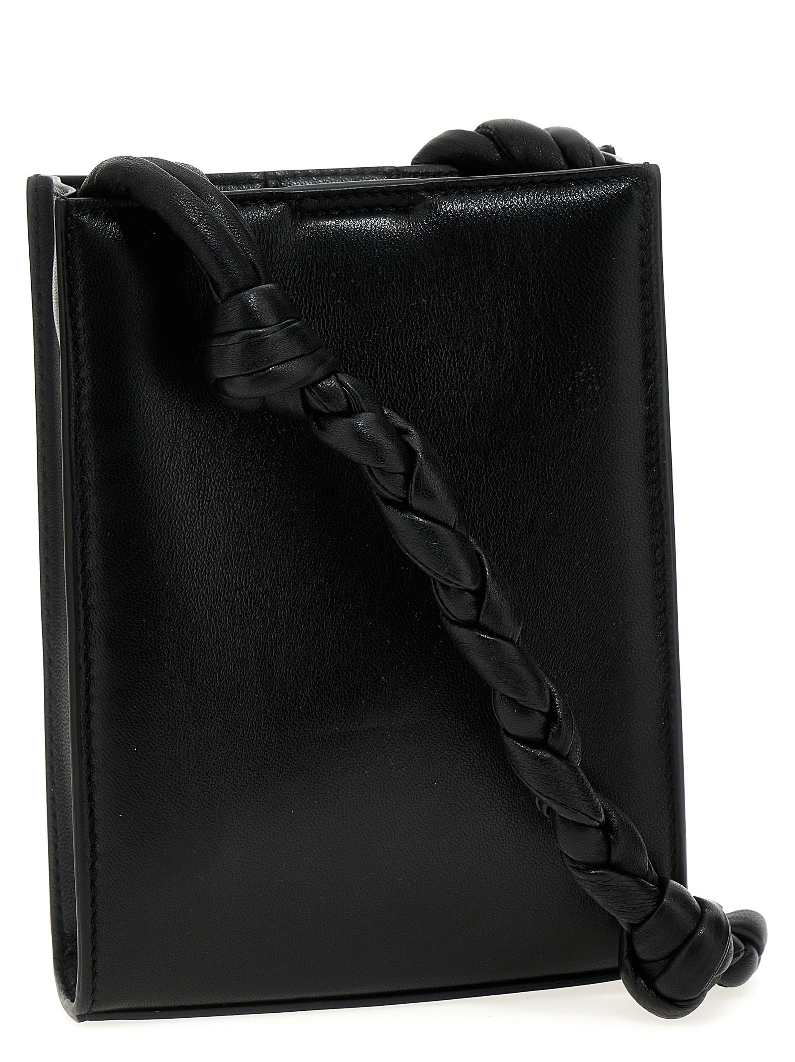 Experience the allure of Jil Sander's Black Calfskin Crossbody Bag, a masterpiece of Italian craftsmanship that embodies timeless elegance and modern sophistication.