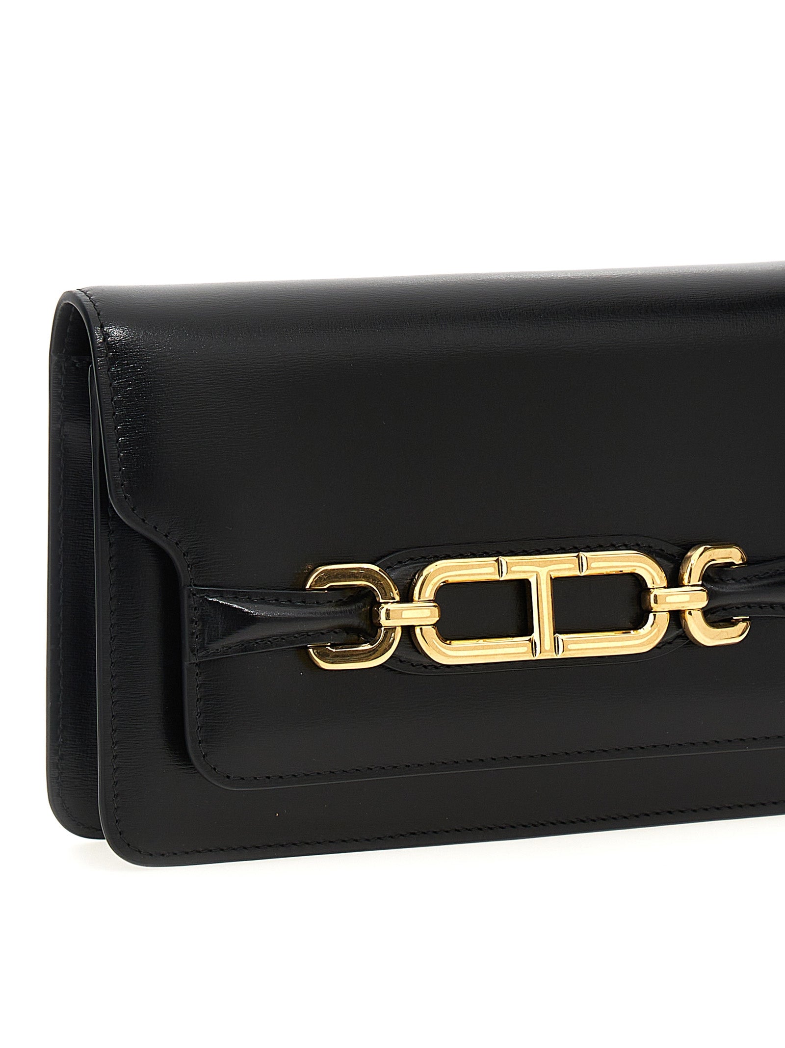Elevate your elegance with the Tom Ford Black Leather Crossbody Bag, a masterpiece of Italian craftsmanship that embodies sophistication and timeless allure.