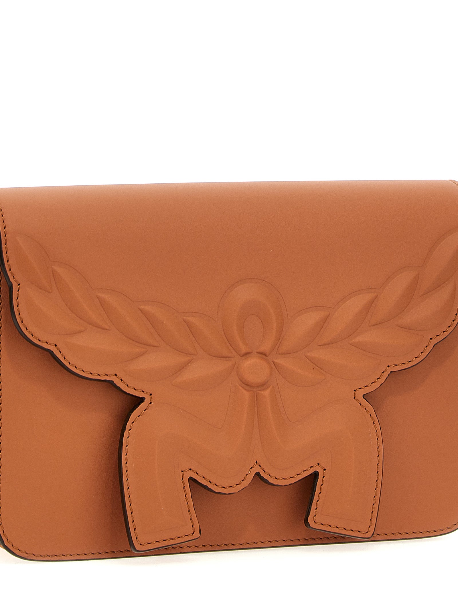 Elevate your allure with MCM's Himmel Brown Calfskin Crossbody Bag, a masterpiece of Italian craftsmanship in luxurious calfskin leather, perfect for the discerning individual.