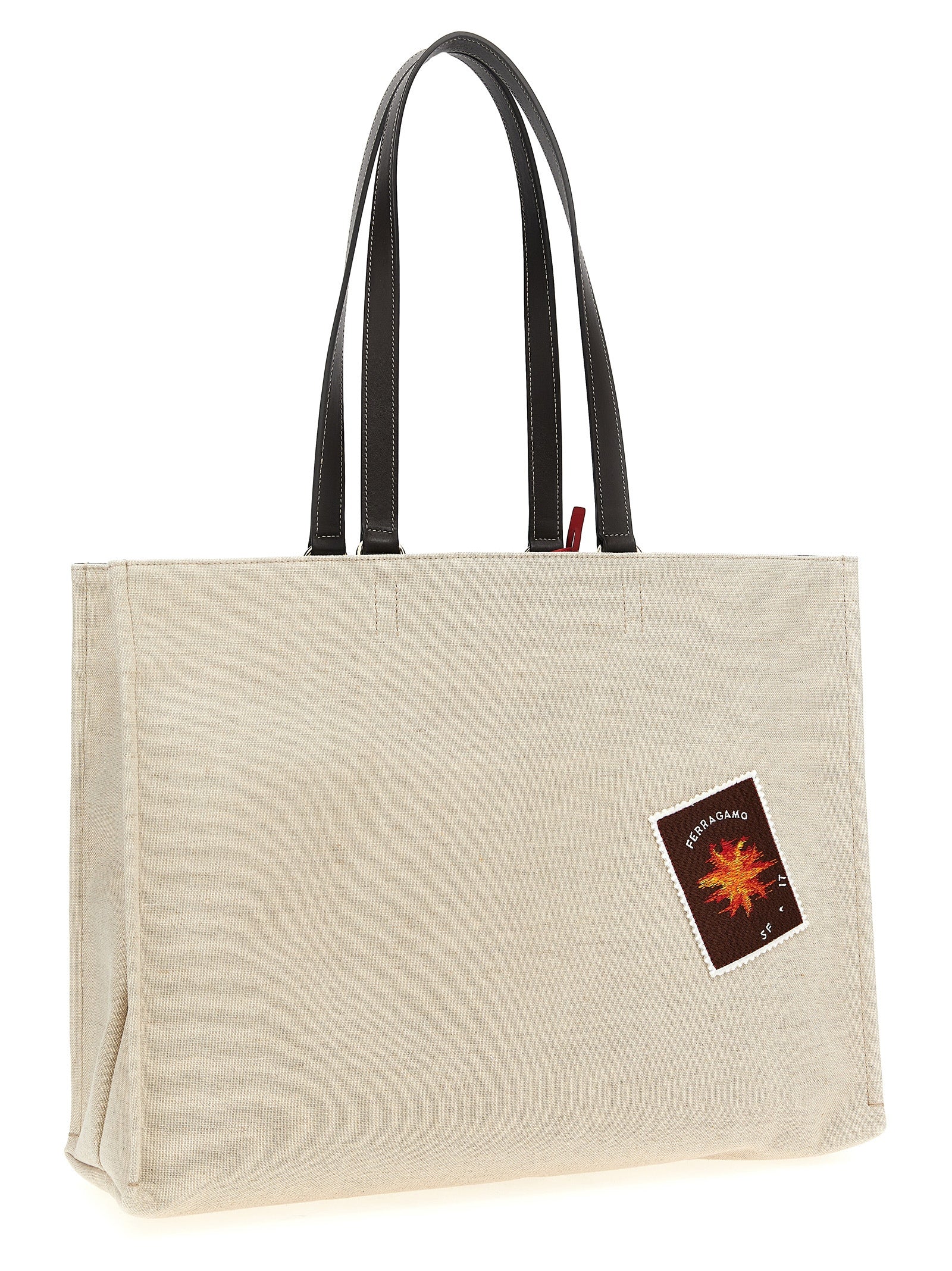 Elevate your elegance with the Ferragamo Beige Fabric Tote Bag, a masterpiece of Italian craftsmanship, blending luxurious jacquard and calfskin for timeless sophistication.