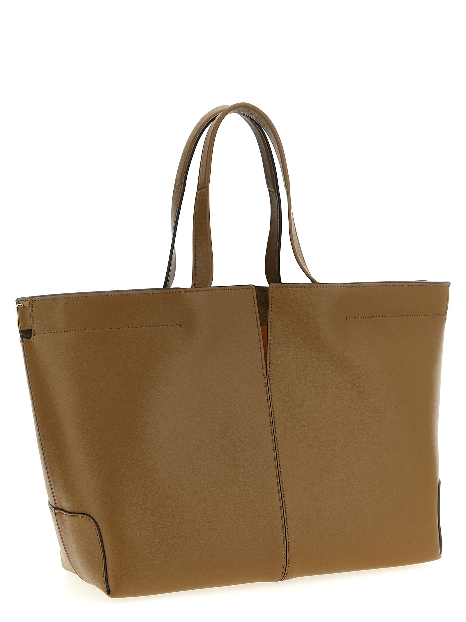 Indulge in the exquisite Tod's Bicolor Calfskin Tote Bag, a masterpiece of Italian craftsmanship that elevates your style with luxurious calfskin and timeless elegance.