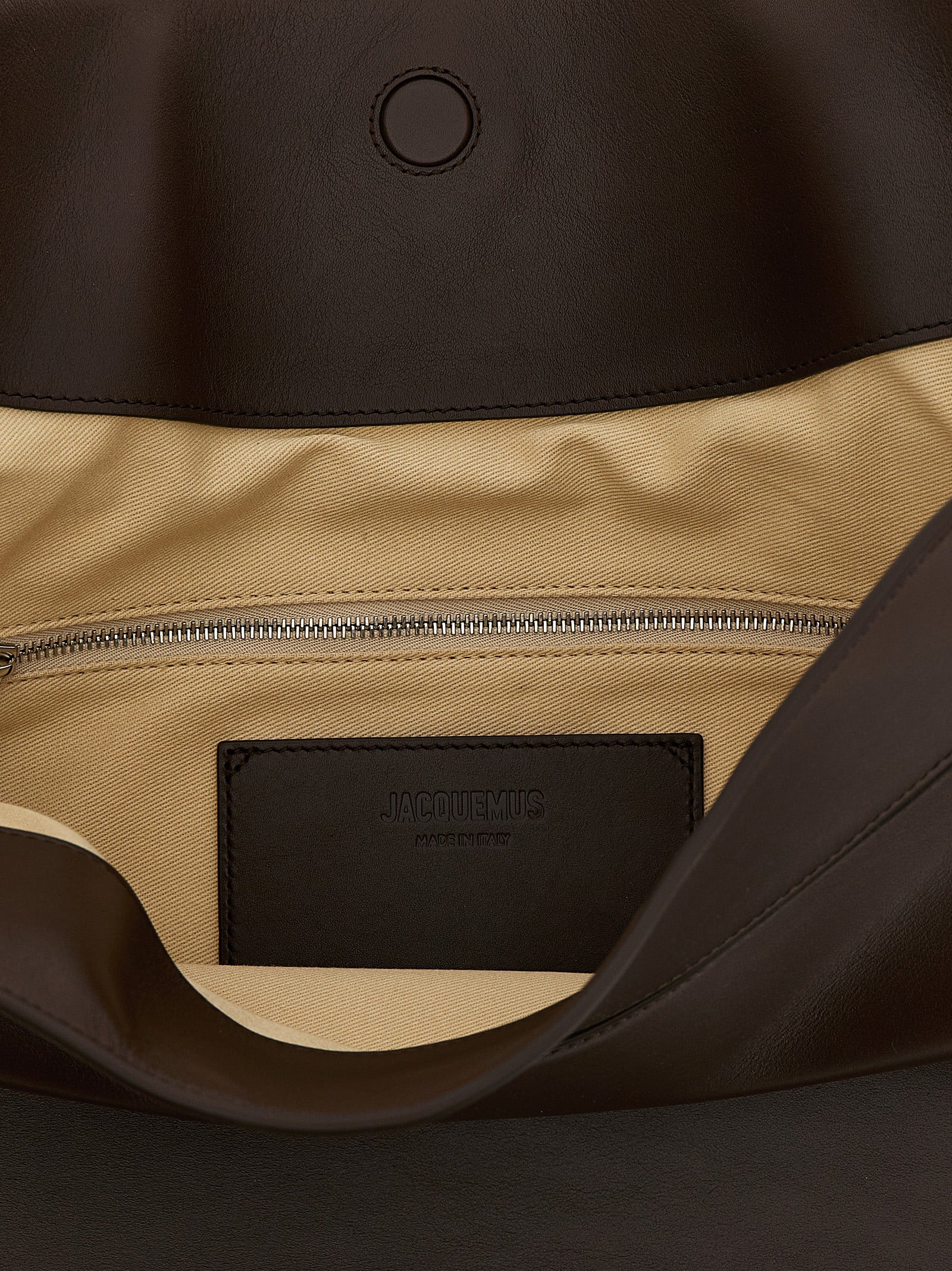 Elevate your style with the Jacquemus Brown Calfskin Shoulder Bag, a masterpiece of artisanal luxury and Parisian elegance, crafted from sumptuous 100% calfskin leather.