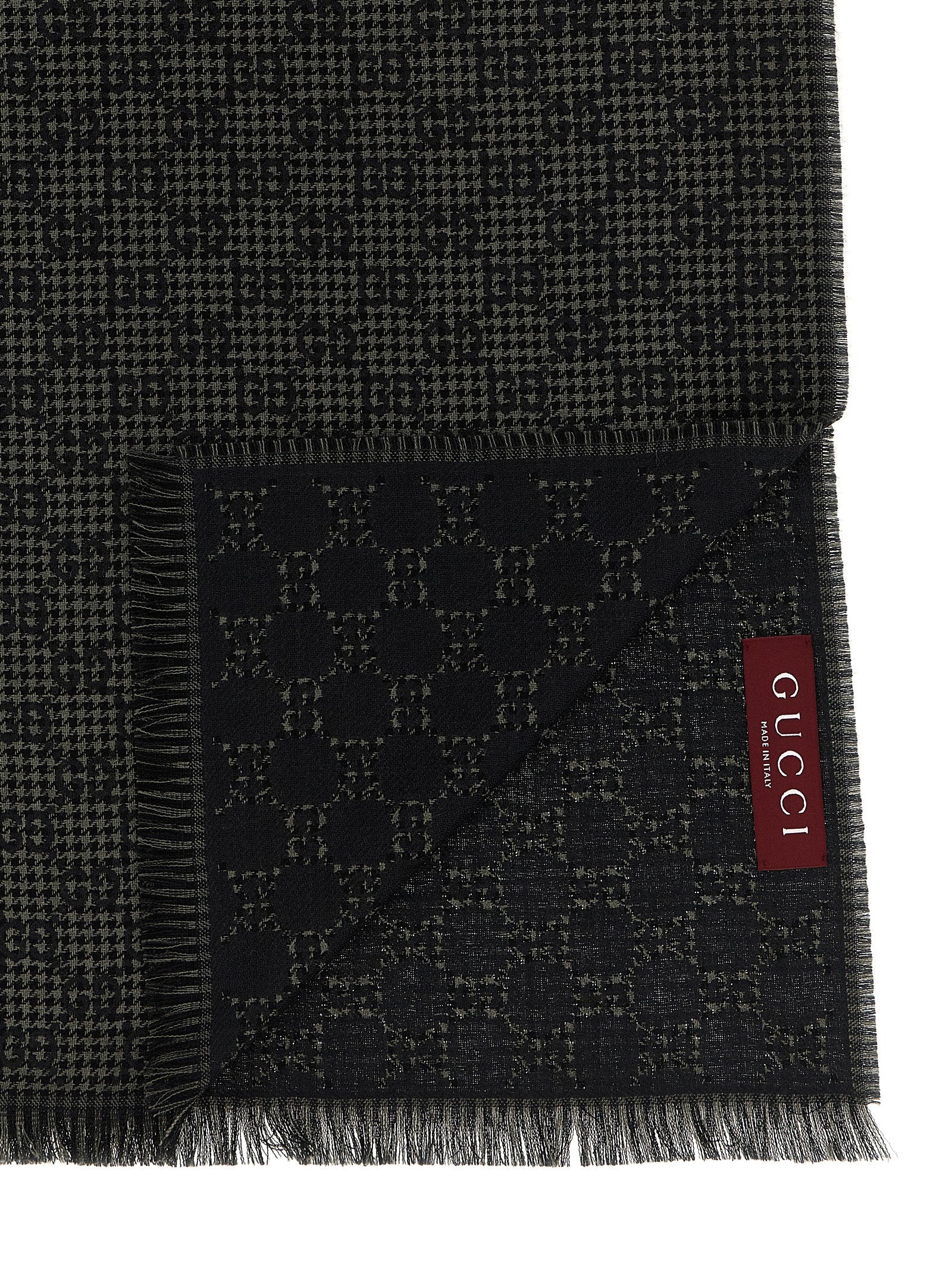 Elevate your style with the Gucci Multicolor Silk Foulard, a masterpiece of Italian craftsmanship blending silk and wool, perfect for the discerning connoisseur.