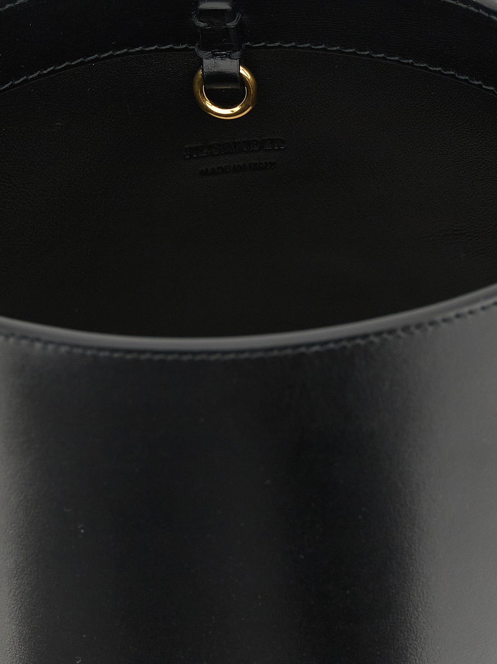 Discover the Jil Sander Black Calfskin Shoulder Bag, a symbol of artisanal luxury crafted in Italy from premium calfskin, perfect for elevating your sophisticated style.