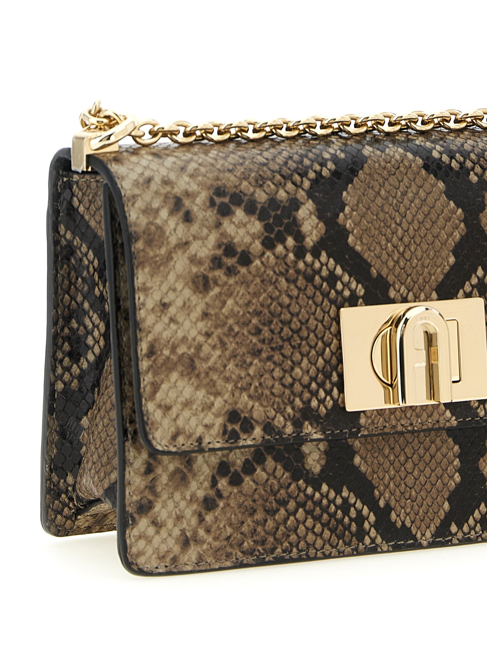 Discover the Furla Gray Goatskin Crossbody Bag, a fusion of python-printed elegance and exquisite craftsmanship, perfect for the discerning connoisseur.