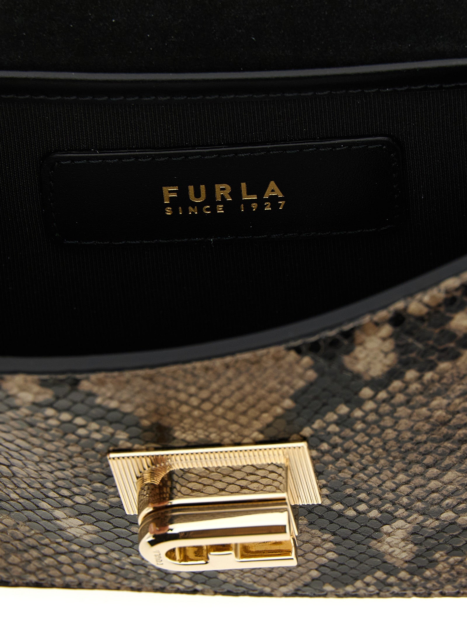 Elevate your elegance with the Furla Gray Goatskin Crossbody Bag, a luxurious blend of python-printed leather and exquisite craftsmanship, perfect for any occasion.