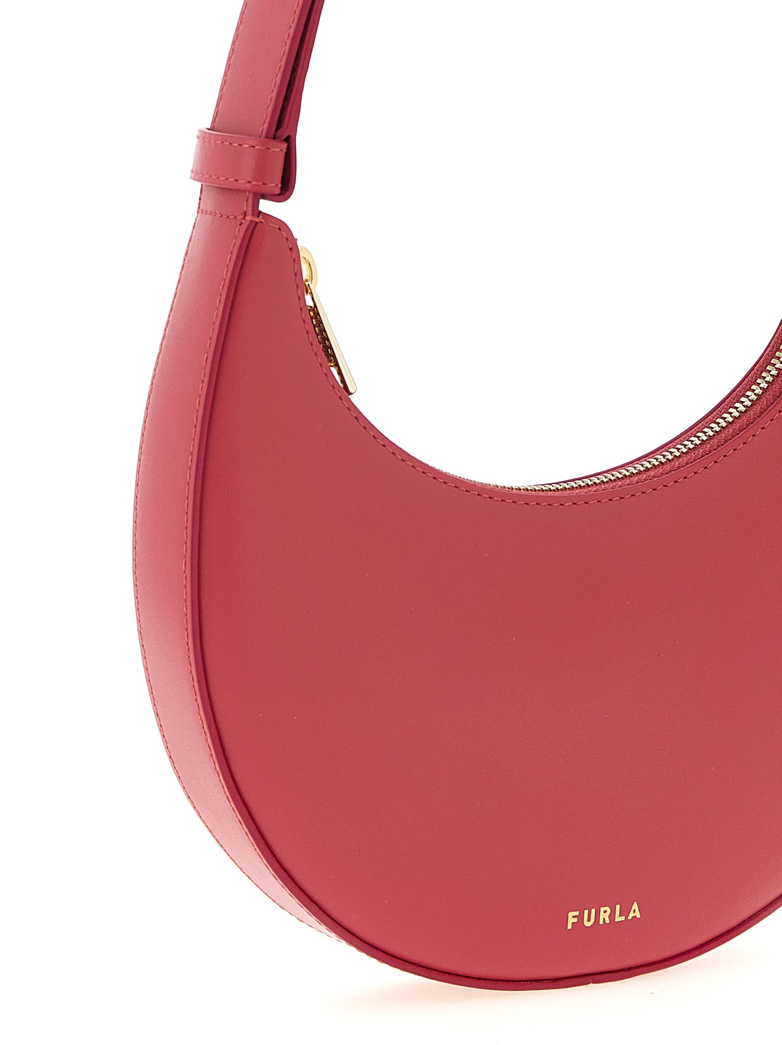 Discover the Furla Fuchsia Calfskin Shoulder Bag, a masterpiece of artisanal luxury crafted from exquisite calfskin leather, perfect for the discerning trendsetter.