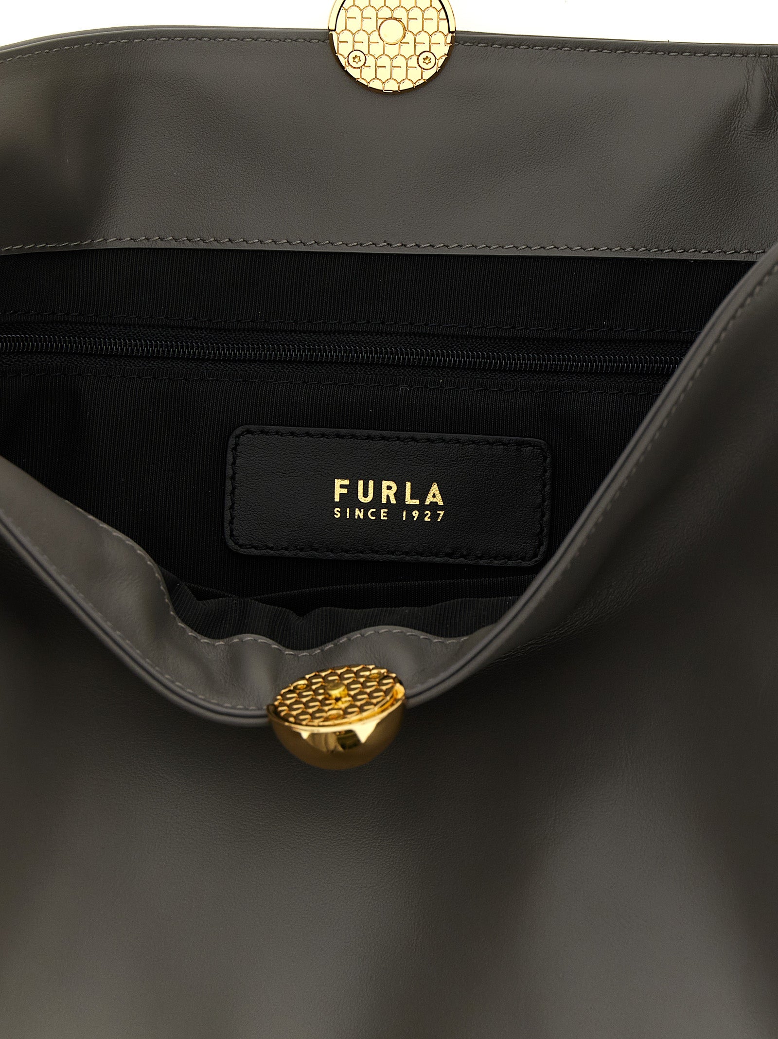 Indulge in the Furla Gray Calfskin Shoulder Bag, a masterpiece of Italian craftsmanship that exudes sophistication and elegance for the discerning individual.