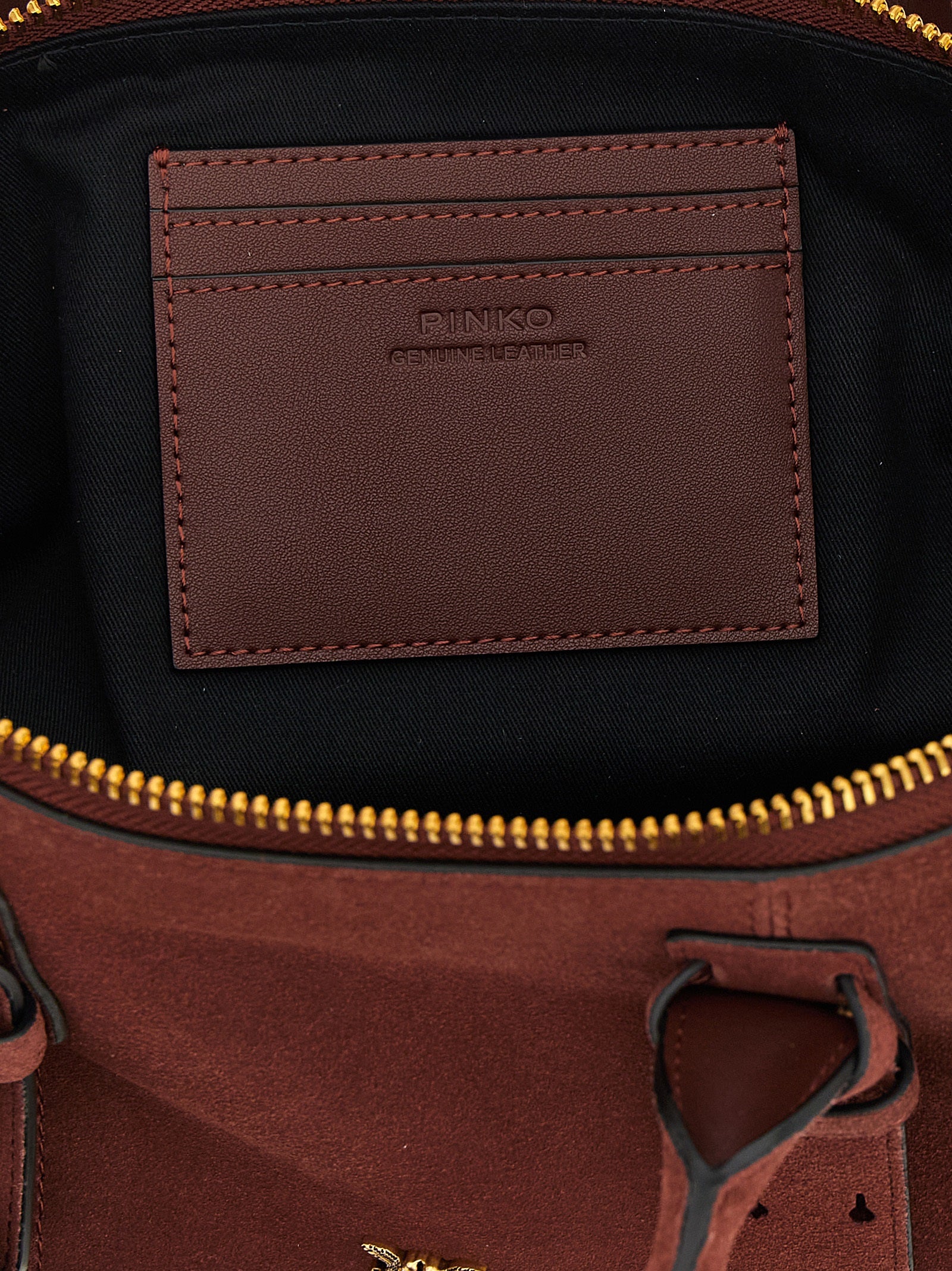 Indulge in the PINKO Bordeaux Cowhide Shoulder Bag, a masterpiece of artisanal luxury crafted from exquisite cow leather, embodying elegance and sophistication for the discerning individual.
