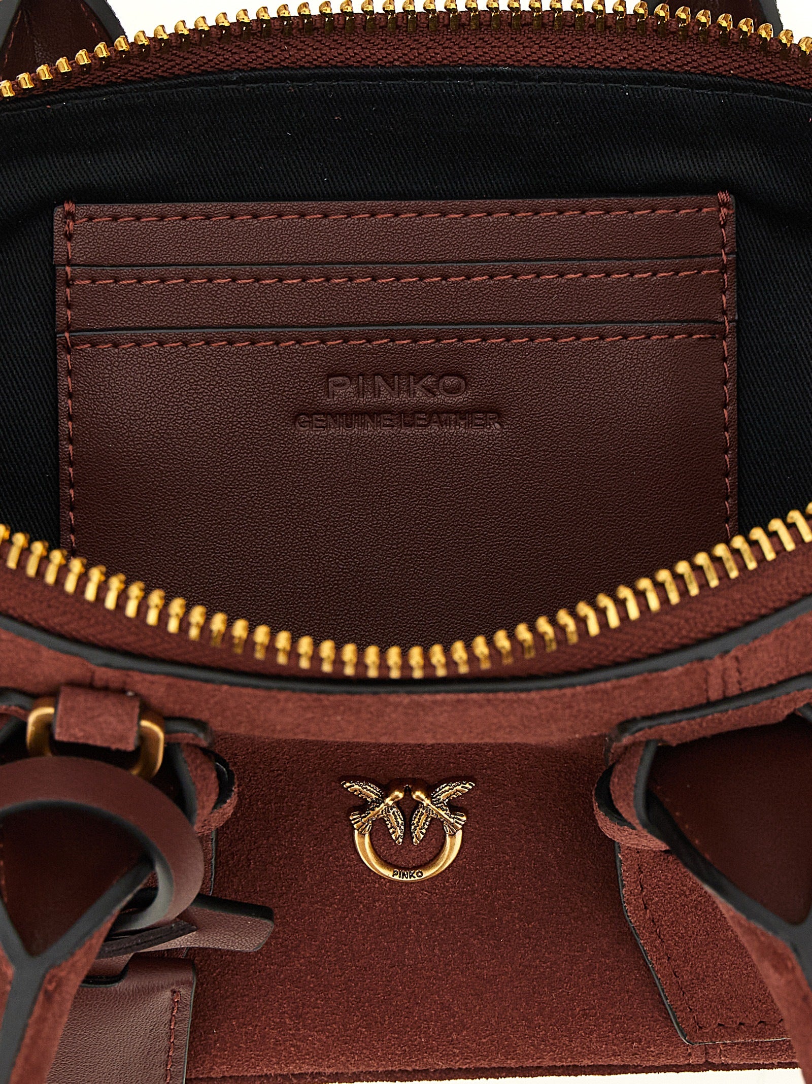 Discover the PINKO Bordeaux Cowhide Shoulder Bag, a luxurious blend of exquisite craftsmanship and timeless elegance, perfect for the discerning modern connoisseur.