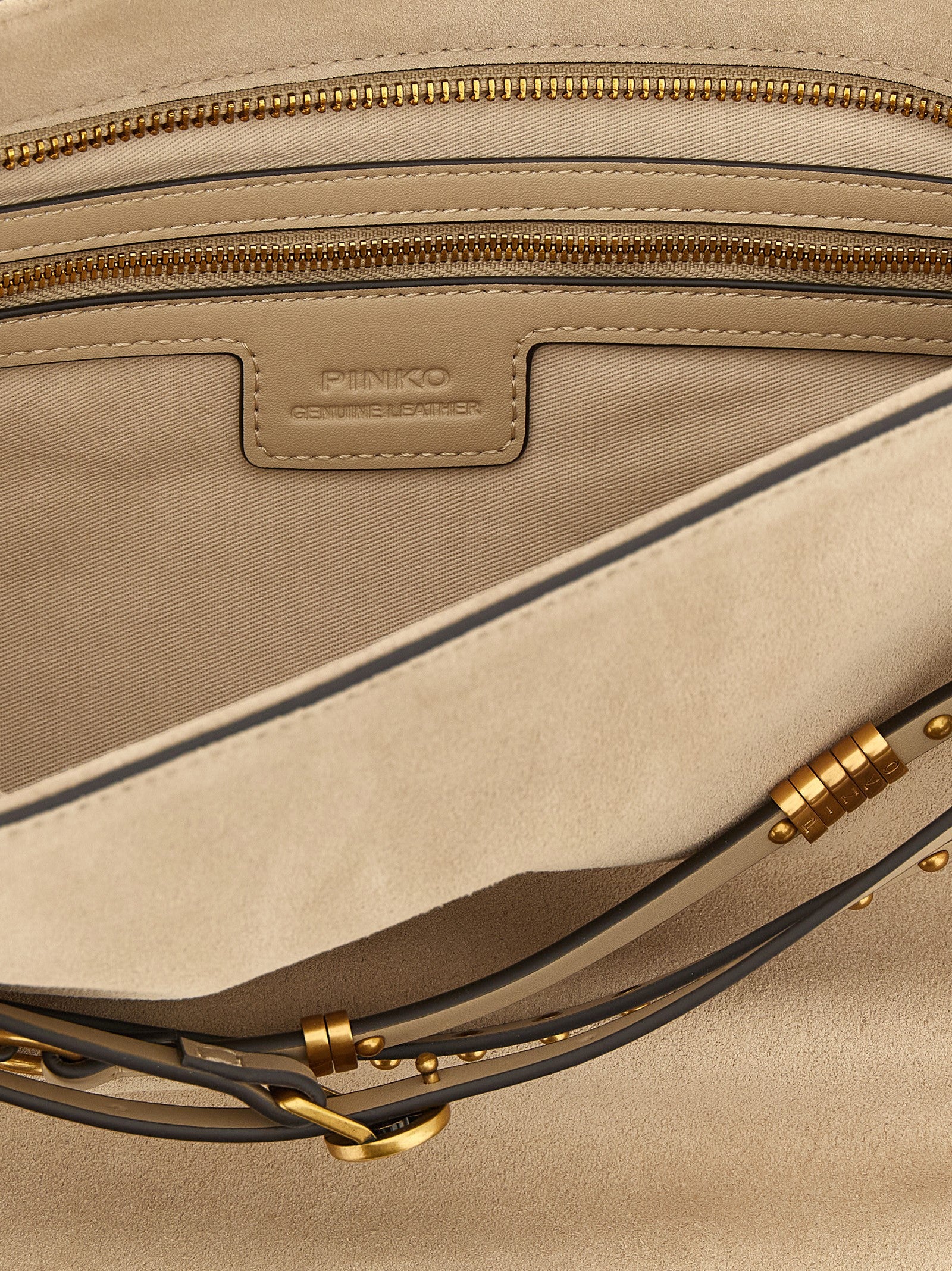 Discover the PINKO Beige Cowhide Shoulder Bag, a masterpiece of artisanal luxury crafted from exquisite cow leather, perfect for elevating any sophisticated ensemble.
