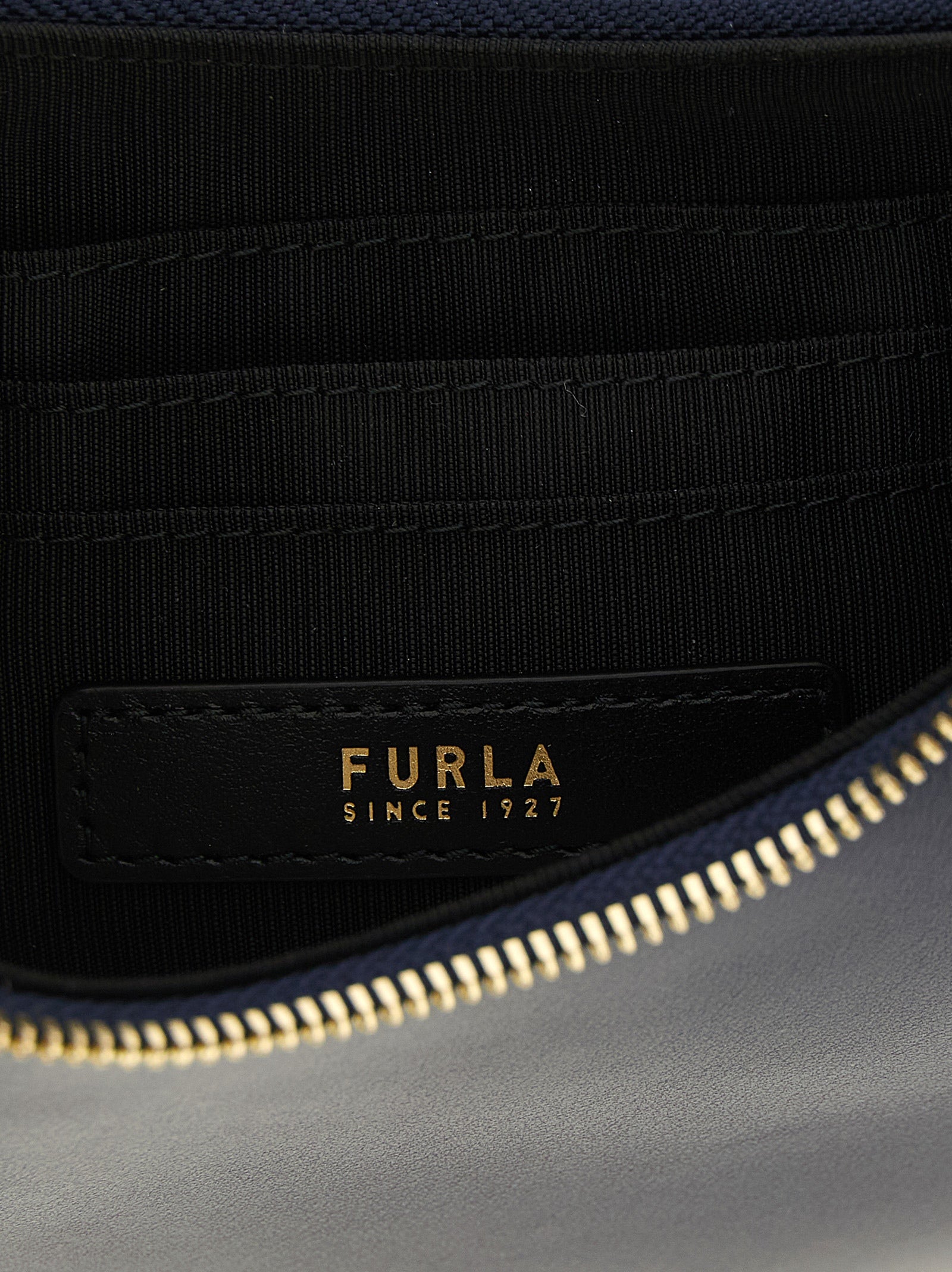 Elevate your elegance with the Furla Blue Calfskin Shoulder Bag, a masterpiece of artisanal luxury crafted from premium calfskin, perfect for any sophisticated occasion.