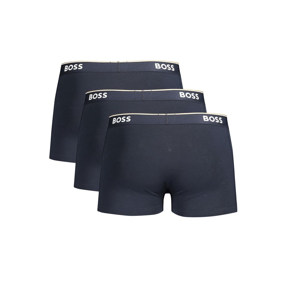 Elevate your essentials with Hugo Boss Blu Cotton Men Boxers, crafted from a luxurious blend of cotton and elastane, embodying sophistication and comfort for the discerning individual.