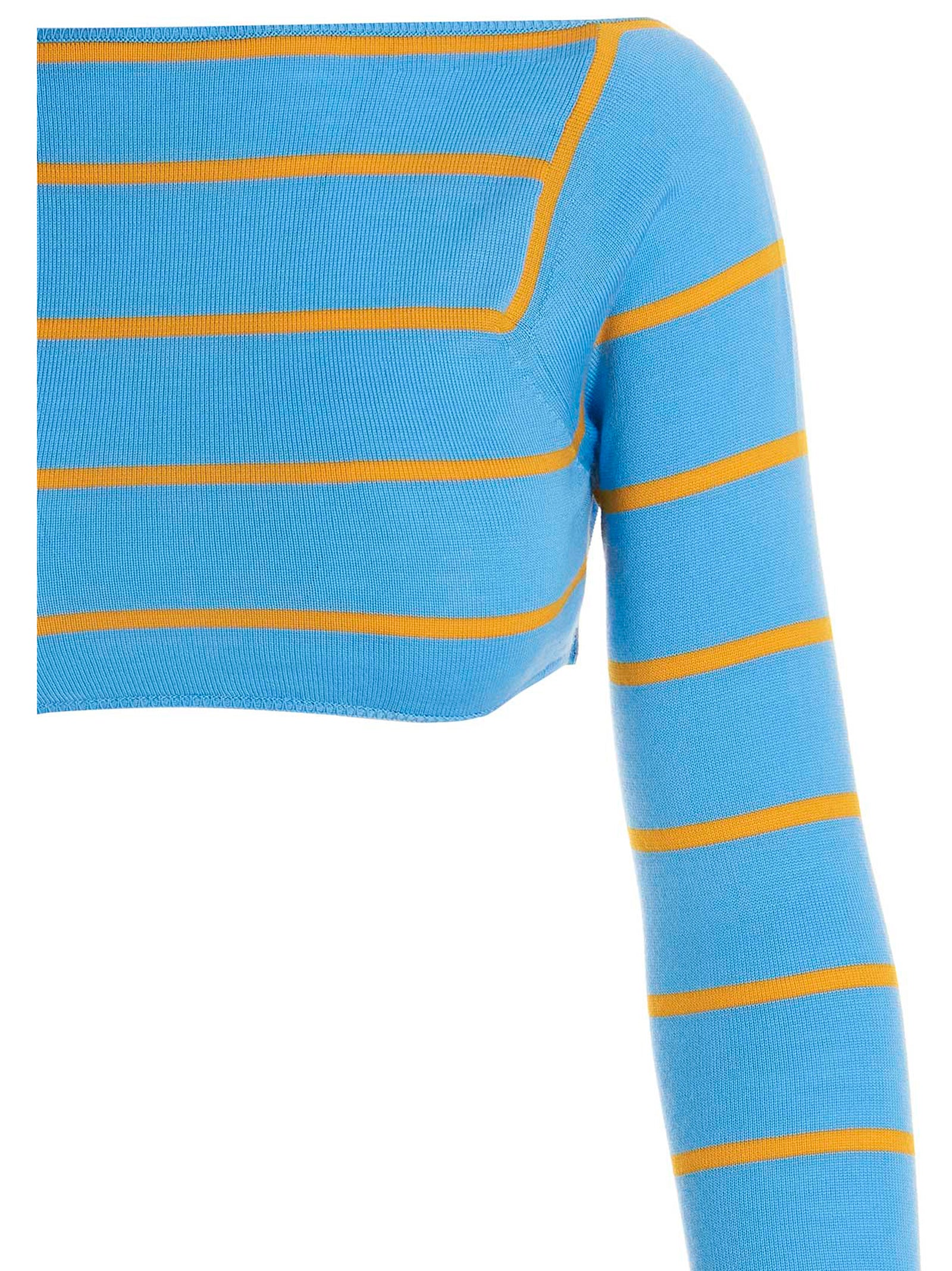 Elevate your wardrobe with the Emilio Pucci Blue Wool Cardigan, a luxurious statement piece crafted from 100% wool, embodying haute couture elegance and contemporary design.