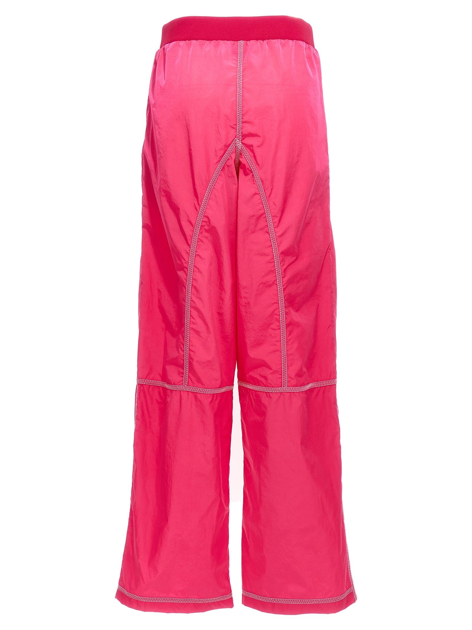 Elevate your wardrobe with Tom Ford's Fuchsia Polyamide Athletic Pants, a blend of luxurious comfort and avant-garde design, crafted for the discerning individual.