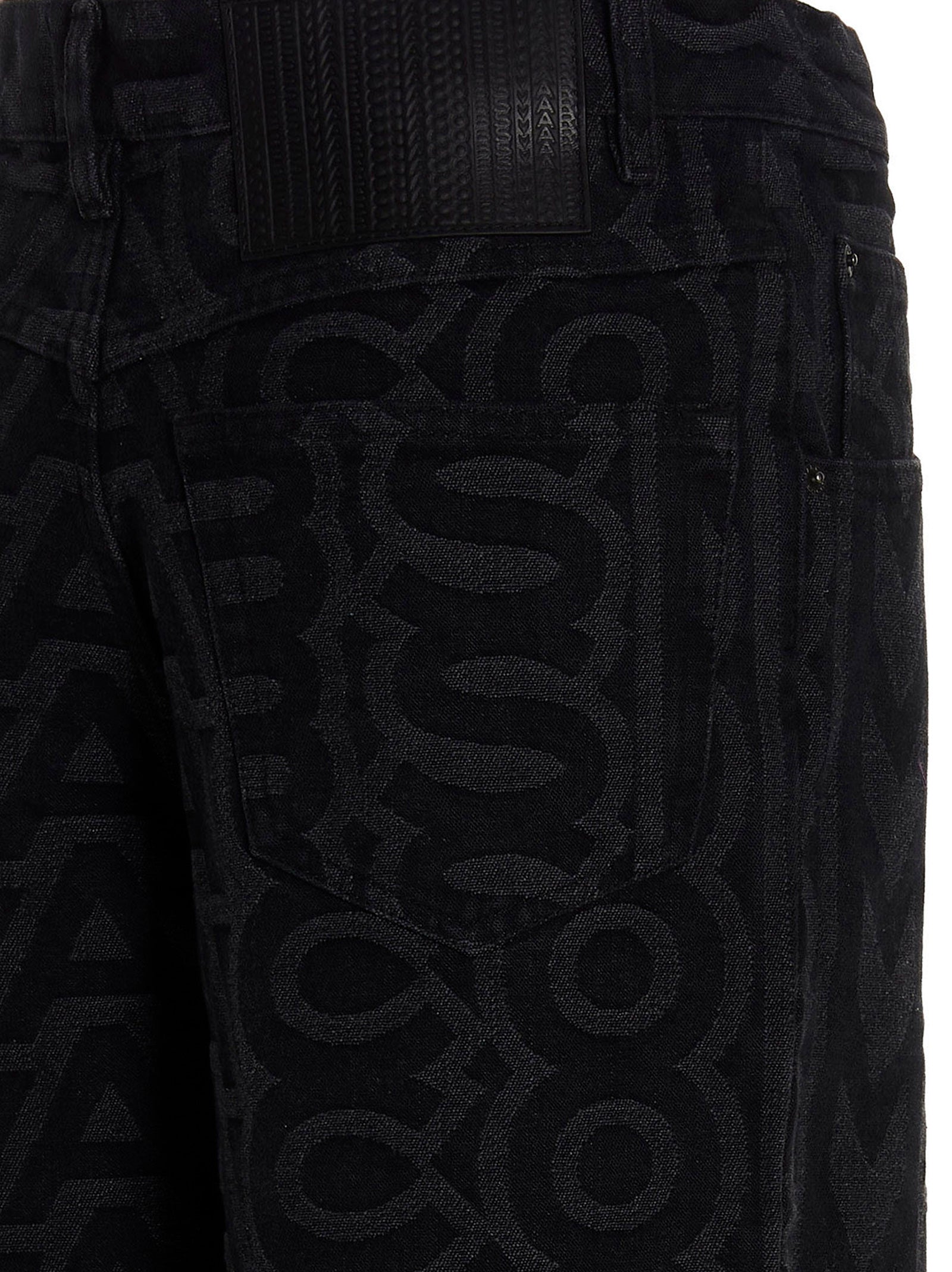 Elevate your style with Marc Jacobs' Black Cotton Jeans, a luxurious blend of artisanal craftsmanship and modern elegance, perfect for the discerning fashionista.