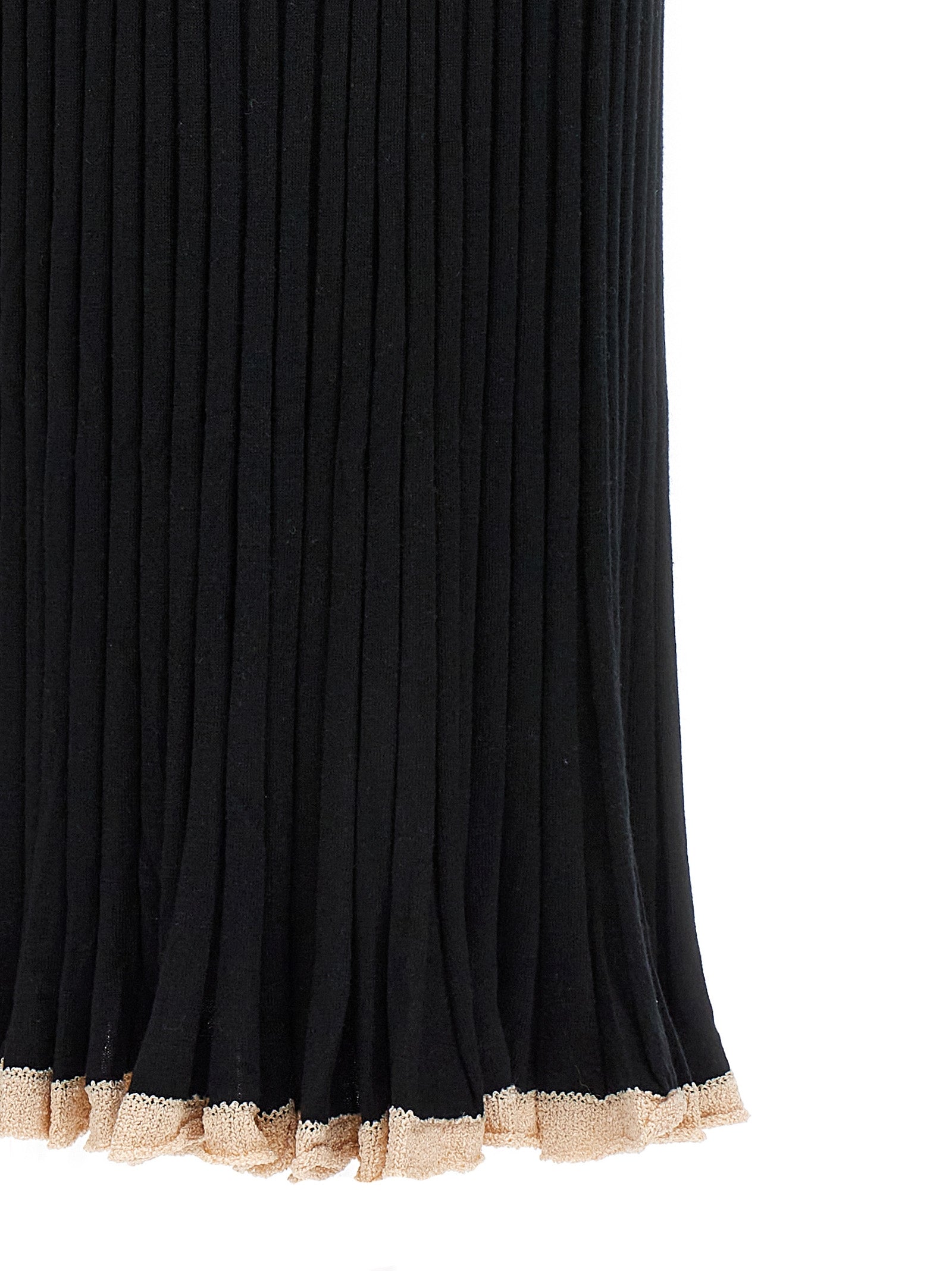Indulge in the Proenza Schouler Black Silk Midi Skirt, a luxurious silk-cashmere blend masterpiece that redefines elegance and allure for the discerning fashion connoisseur.