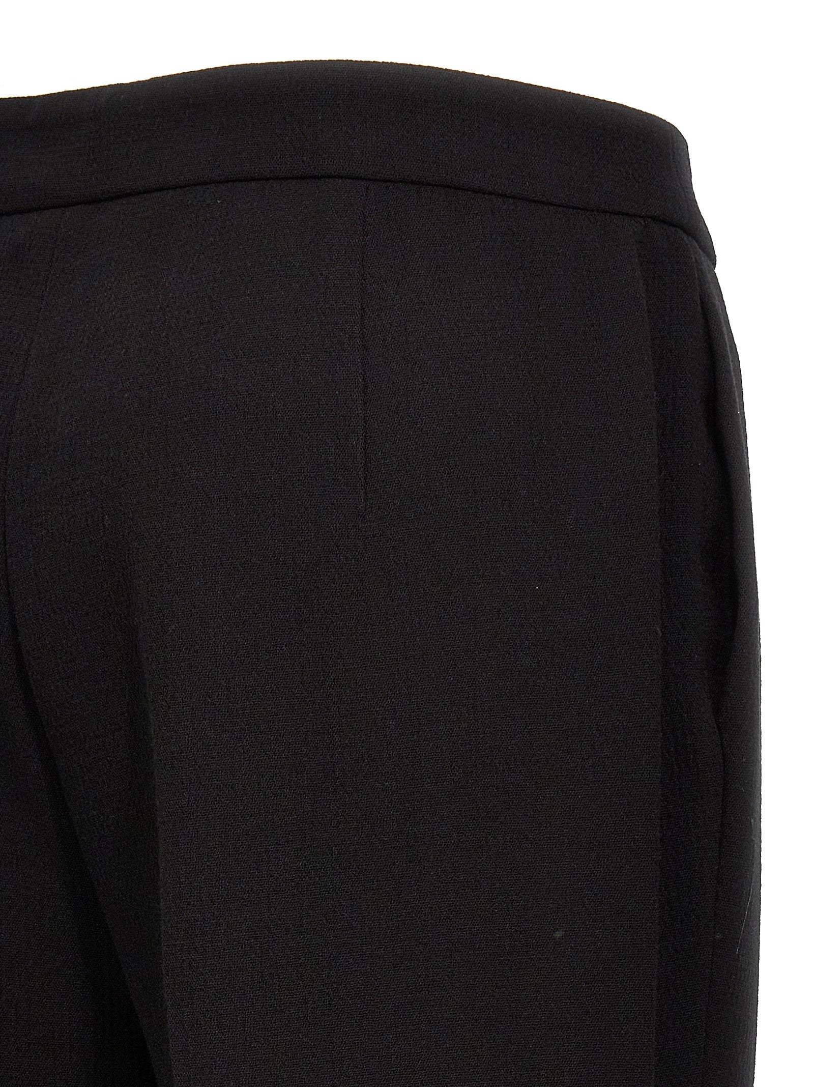 Experience the allure of Moschino's Black Viscose Dress Pants, expertly crafted in Italy from a luxurious blend, embodying sophistication and timeless elegance for the discerning individual.