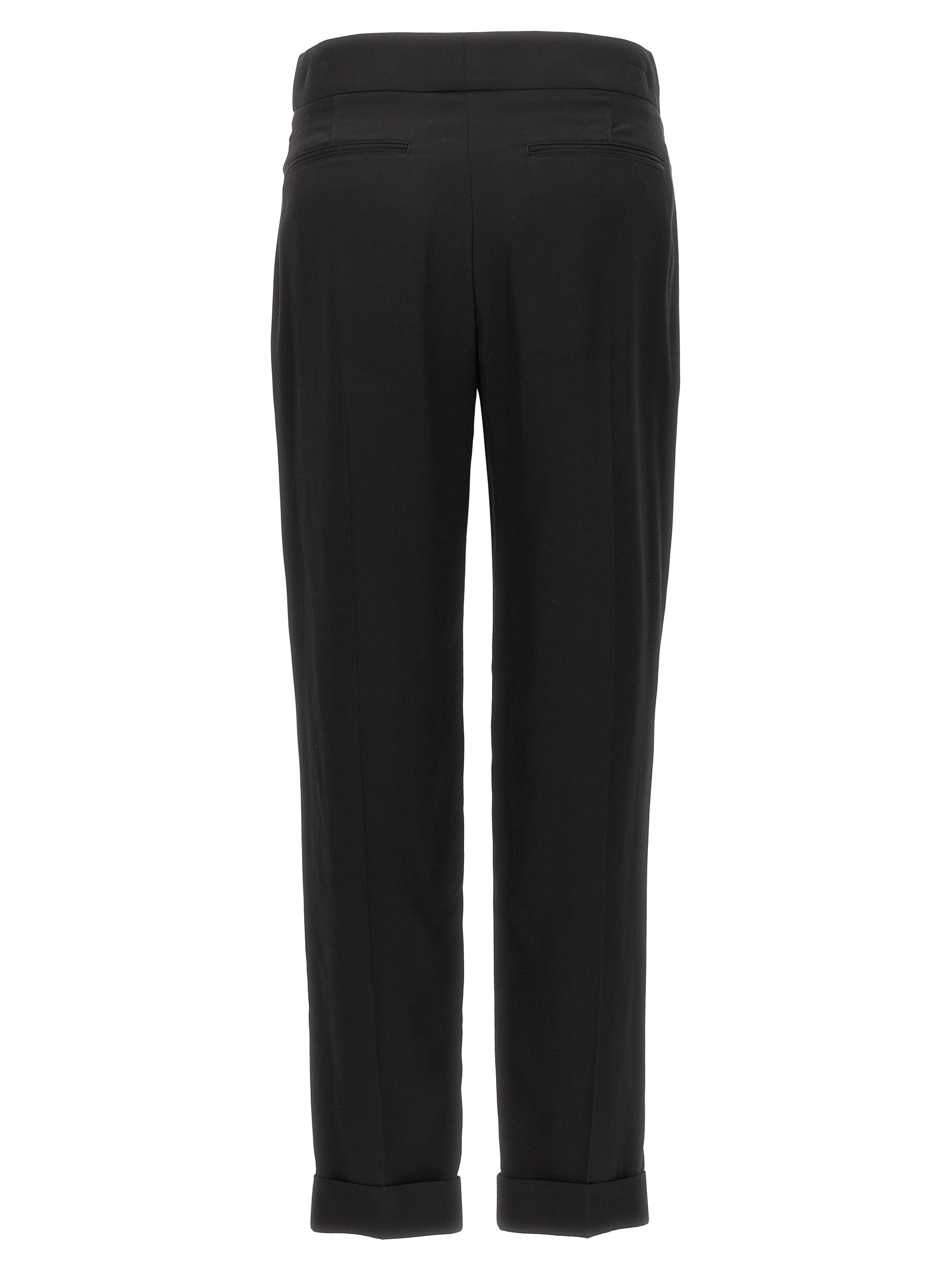 Experience the allure of Tom Ford's Black Viscose Dress Pants, where exquisite craftsmanship meets timeless elegance, perfect for the discerning individual.