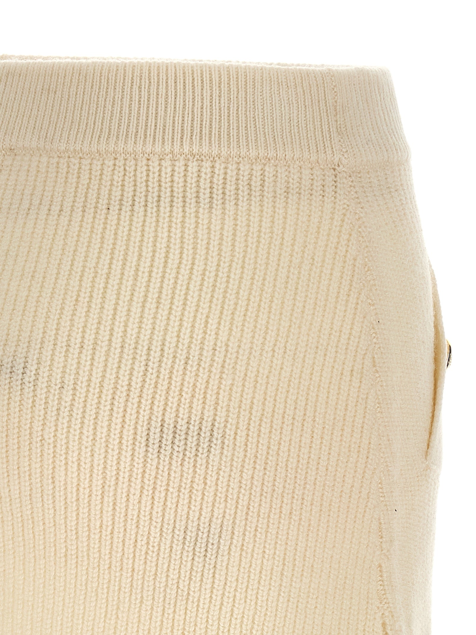 Elevate your elegance with the MICHAEL MICHAEL KORS White Wool Long Skirt, a timeless blend of luxury and comfort, perfect for any sophisticated occasion.