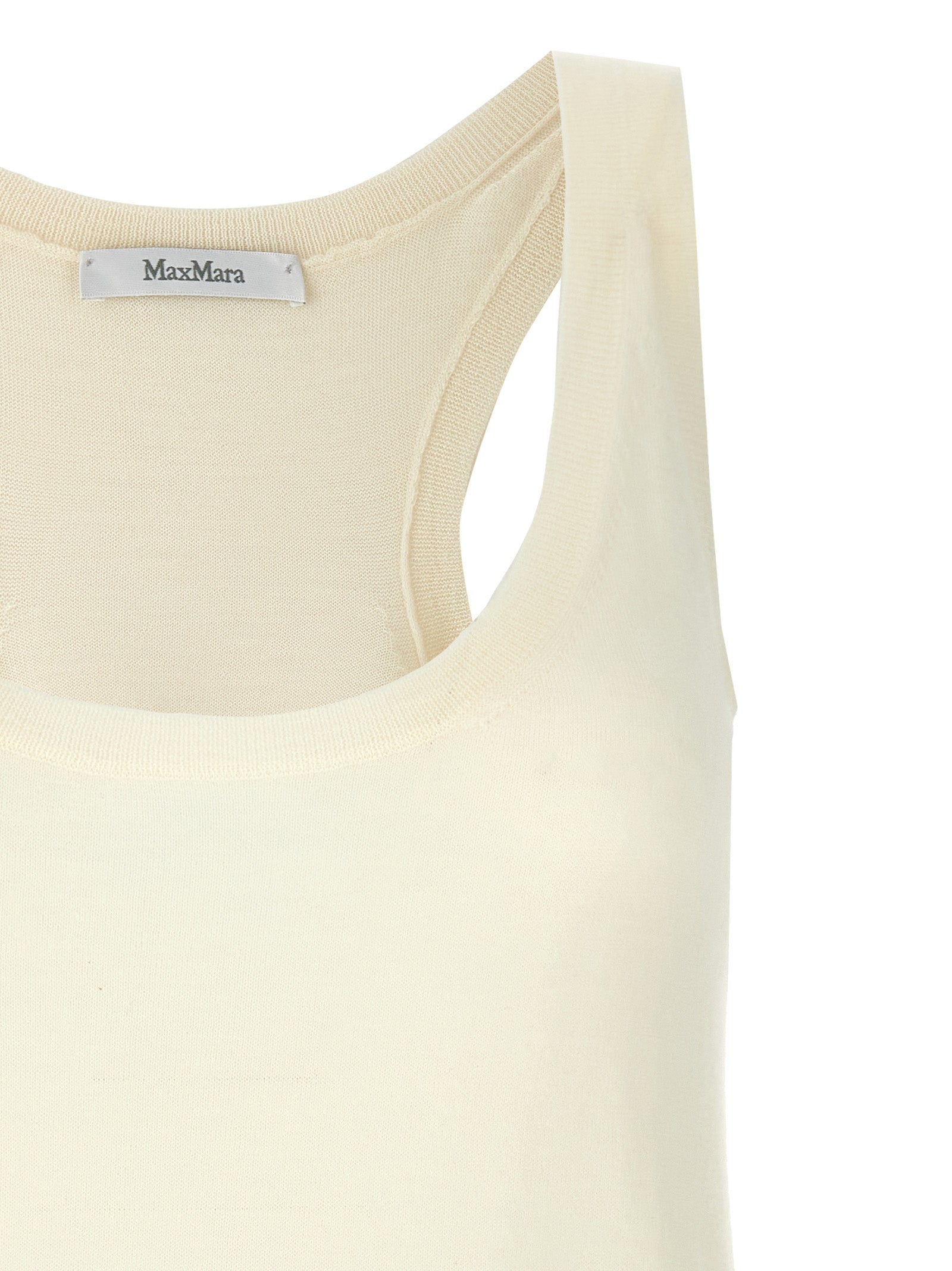 Elevate your wardrobe with the Max Mara White Cashmere Tank Top, a luxurious blend of 100% cashmere, perfect for effortless sophistication and timeless elegance.
