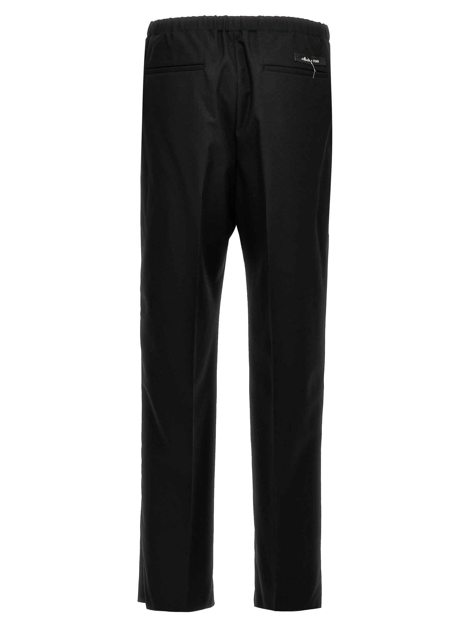 Indulge in the sophistication of Fendi's Black Virgin Wool Dress Pants, where exquisite craftsmanship meets timeless elegance for the discerning fashion connoisseur.