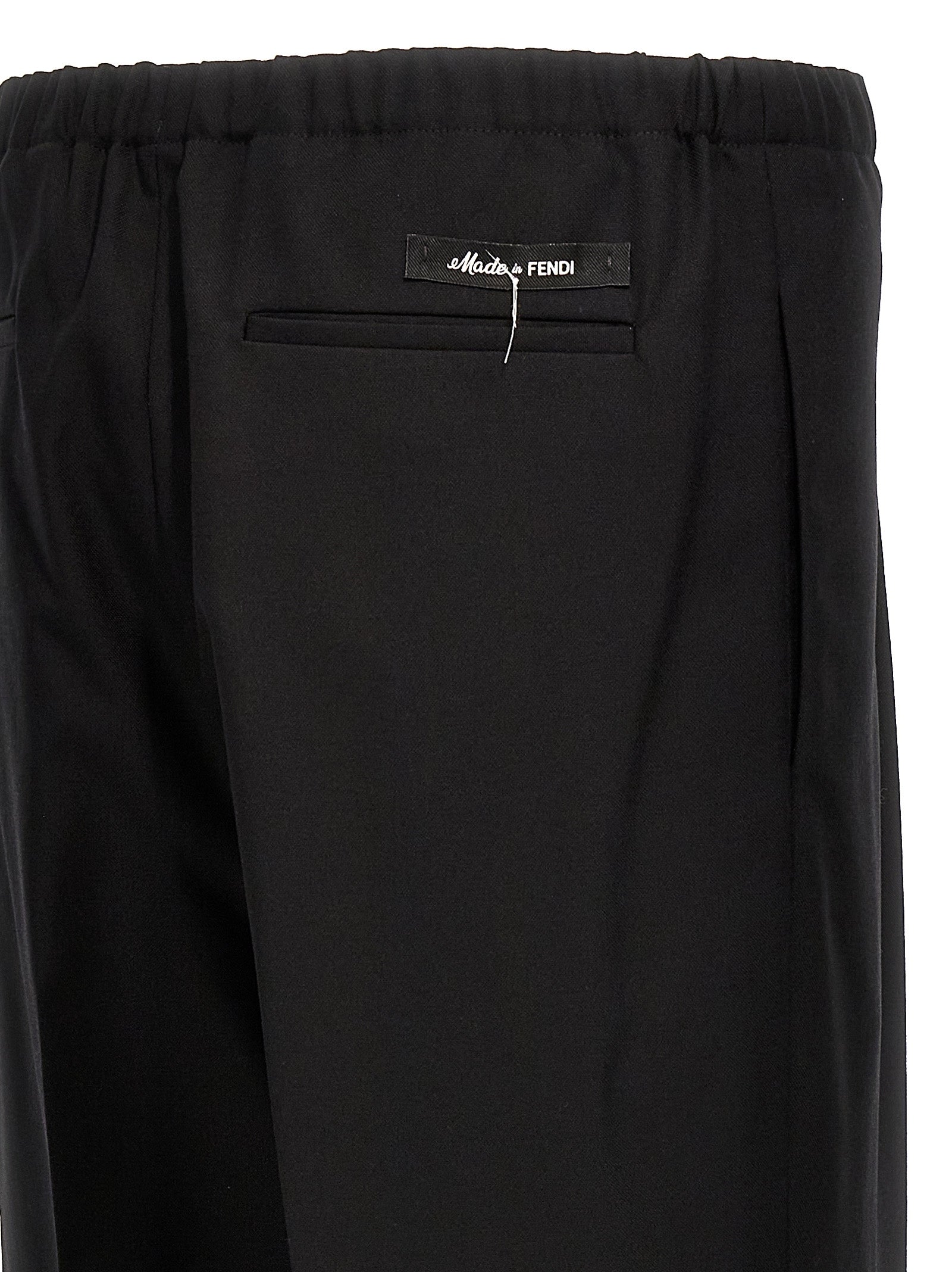 Discover the allure of Fendi's Black Virgin Wool Dress Pants, where exquisite craftsmanship meets timeless elegance, perfect for the sophisticated individual.